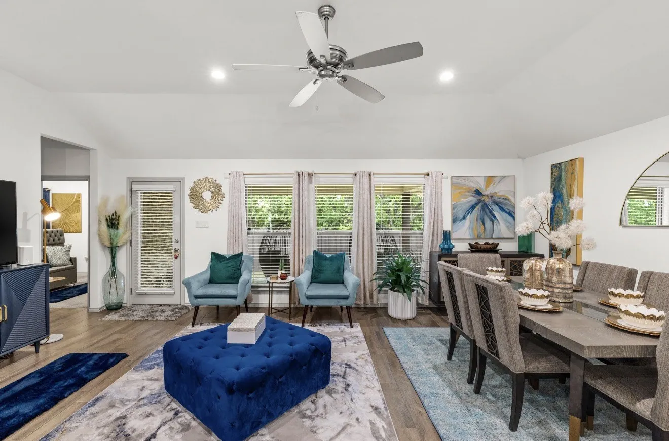 Vaulted ceilings with recessed lighting, wood-finish flooring, and a ceiling fan