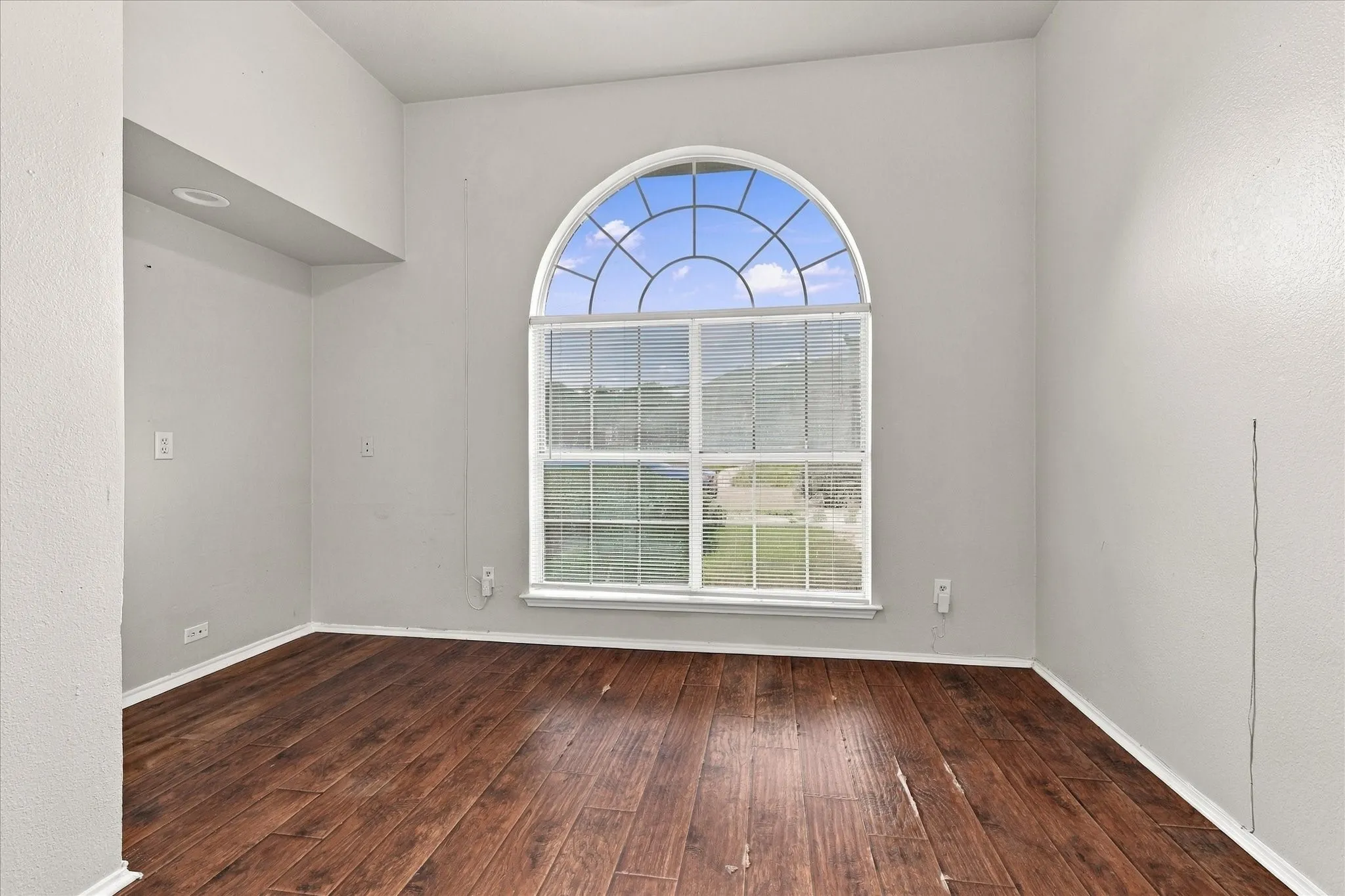 Private office with large window and french doors
