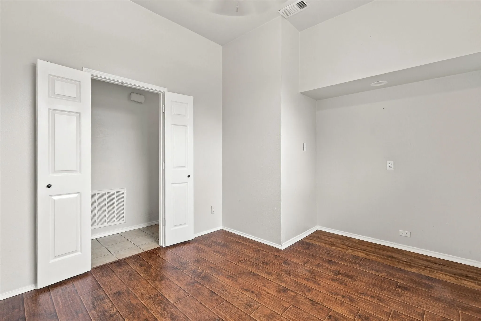 Private office with large window and french doors