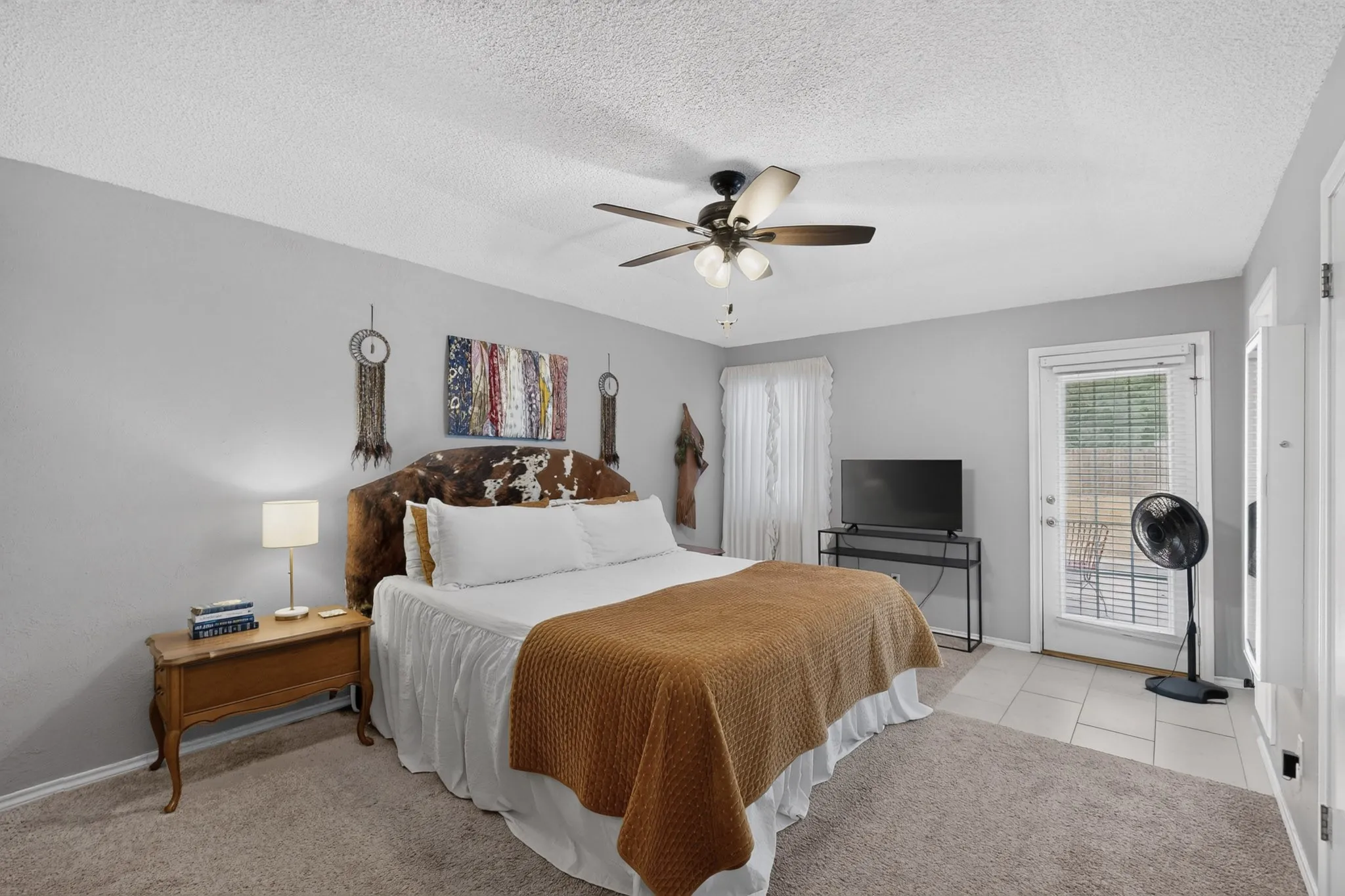 The primary suite faces a quiet, private backyard.
