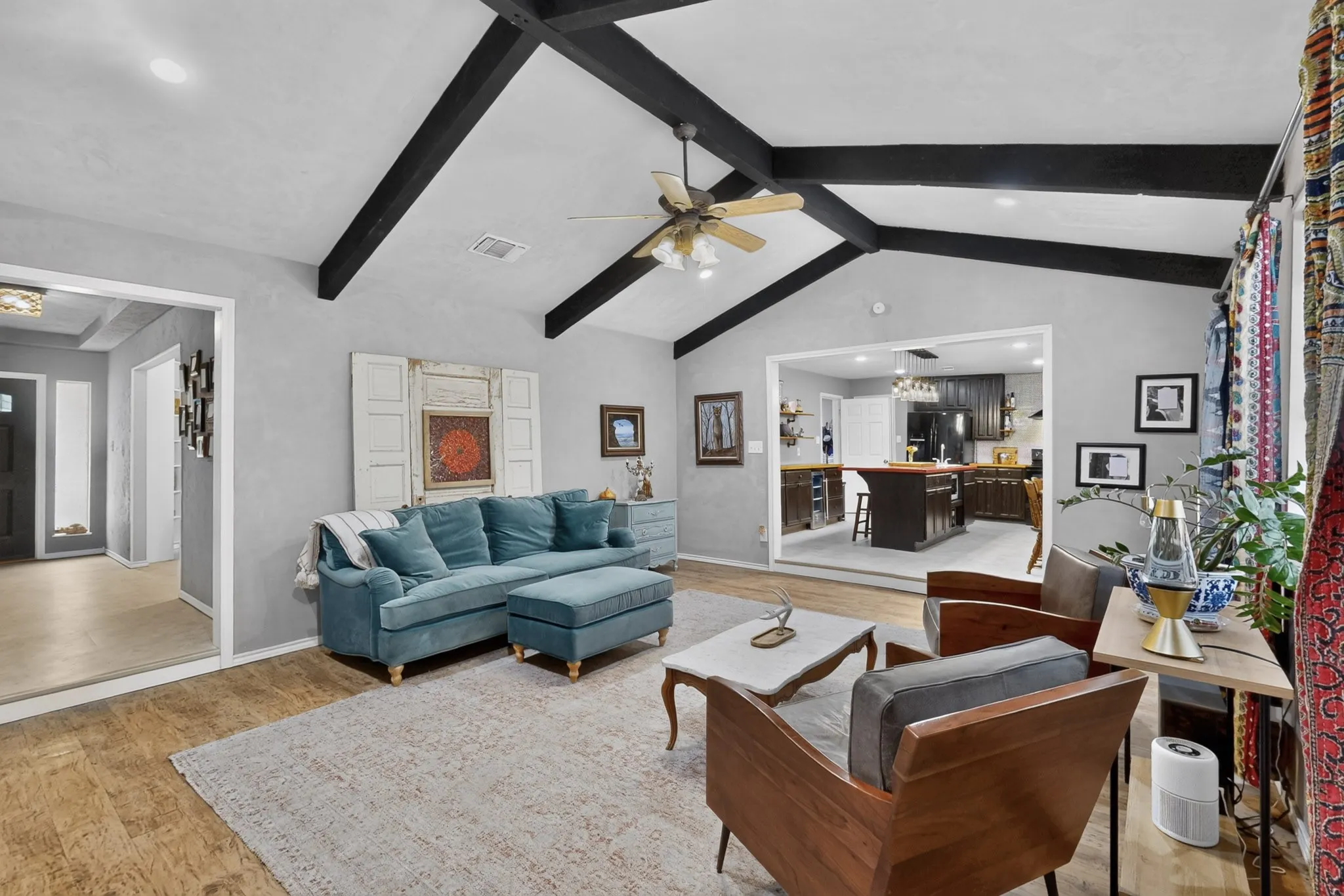 Entering the home, you will find high ceilings and open spaces.
