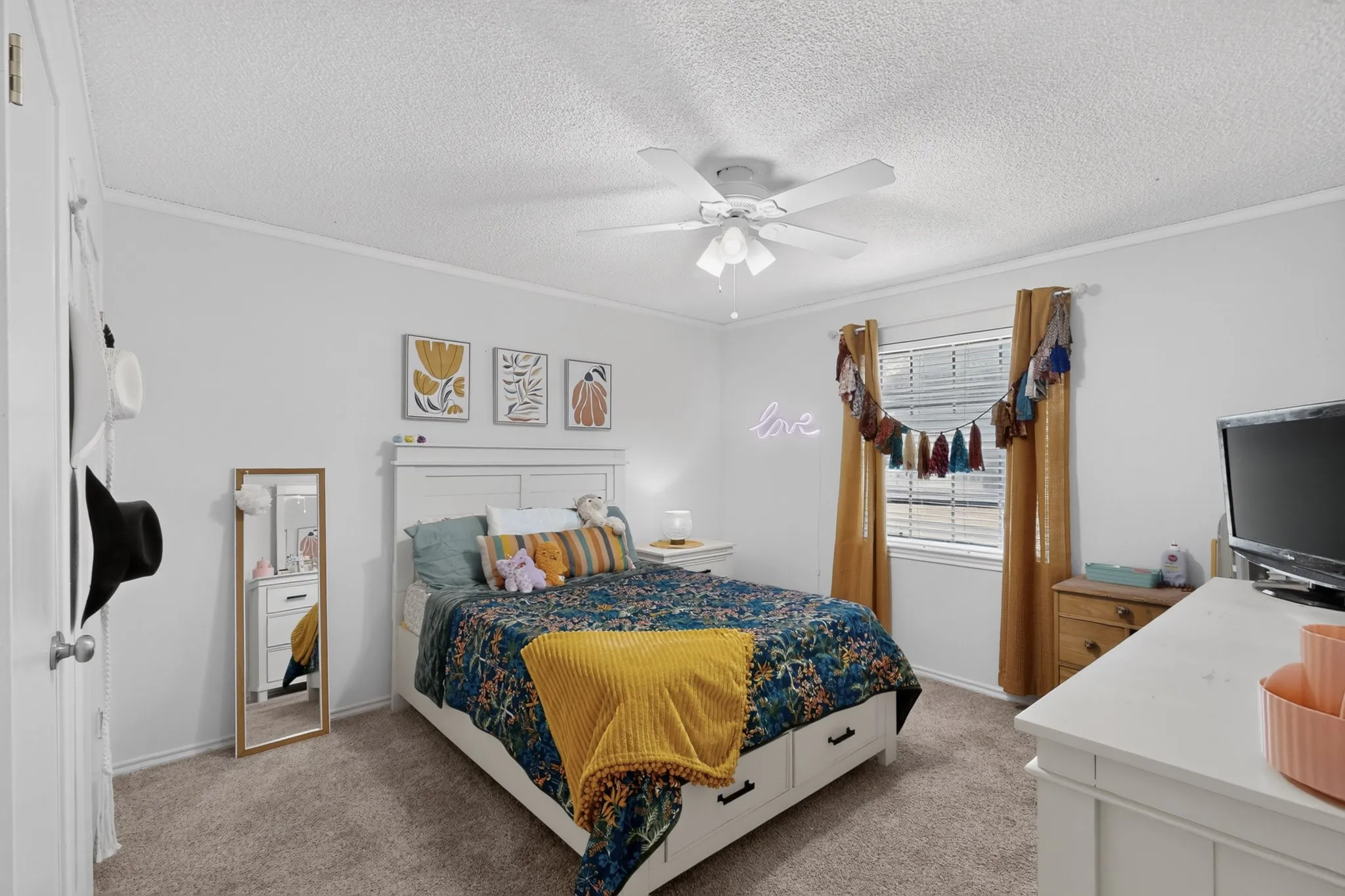 Secondary bedroom faces the front of the home and has great natural light.