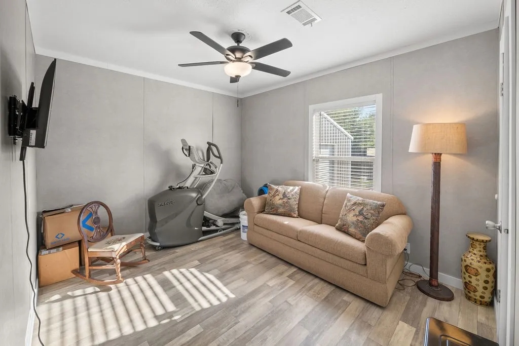Wood-finish flooring with a ceiling fan
