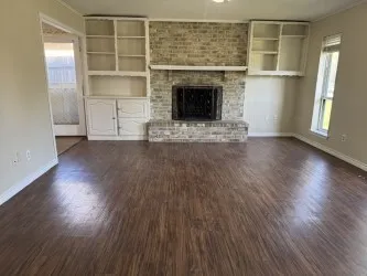 With Gas Fireplace and built in bookshelves