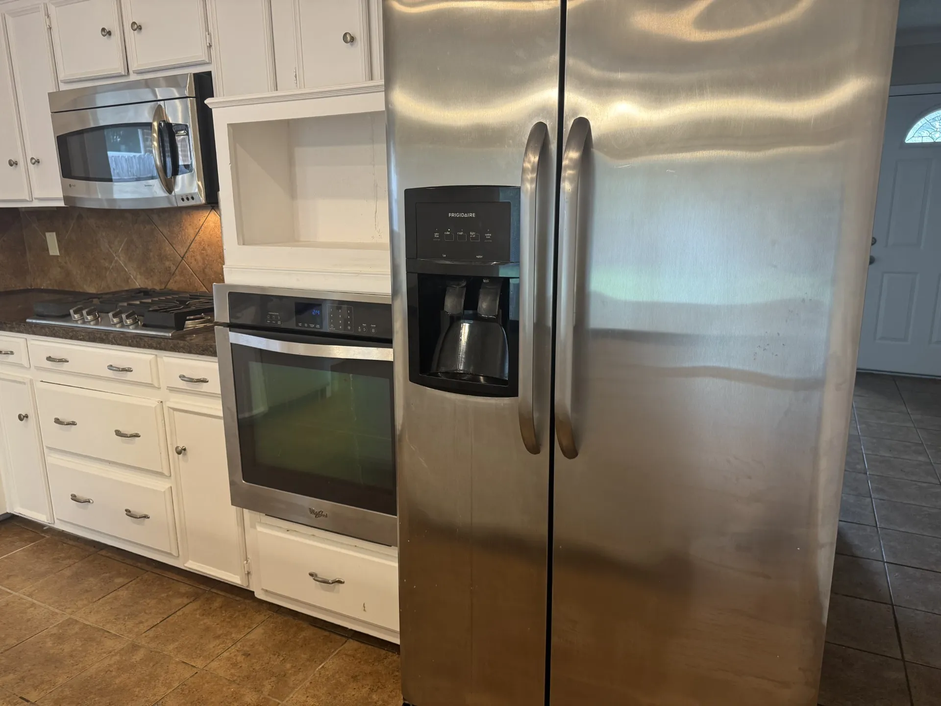 Large Fridge with ice/water, Large Oven, Gas Cooktop and Built in Microwave