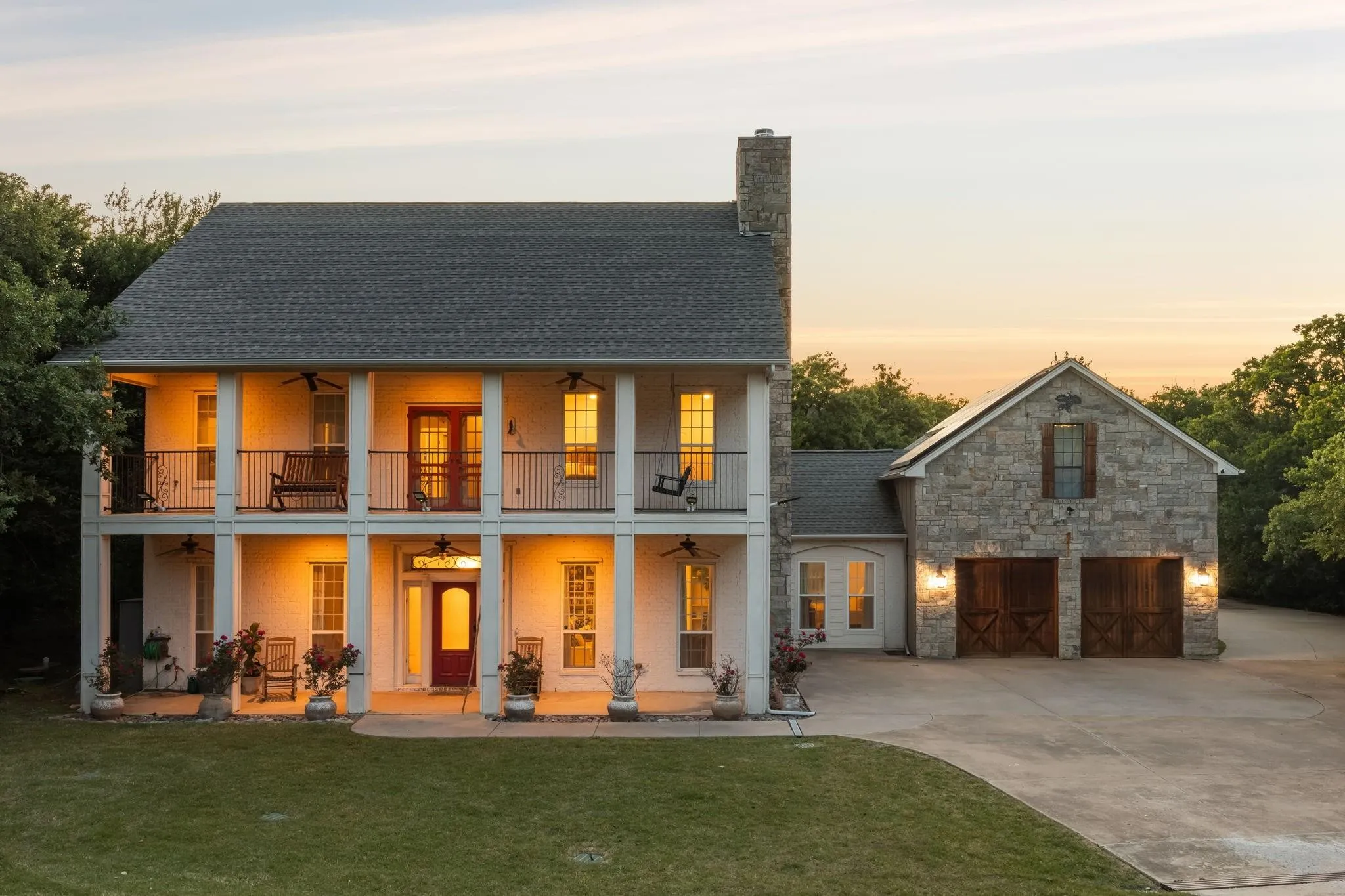 Stunning curb appeal highlighted by timeless architecture and a charming second-story balcony.