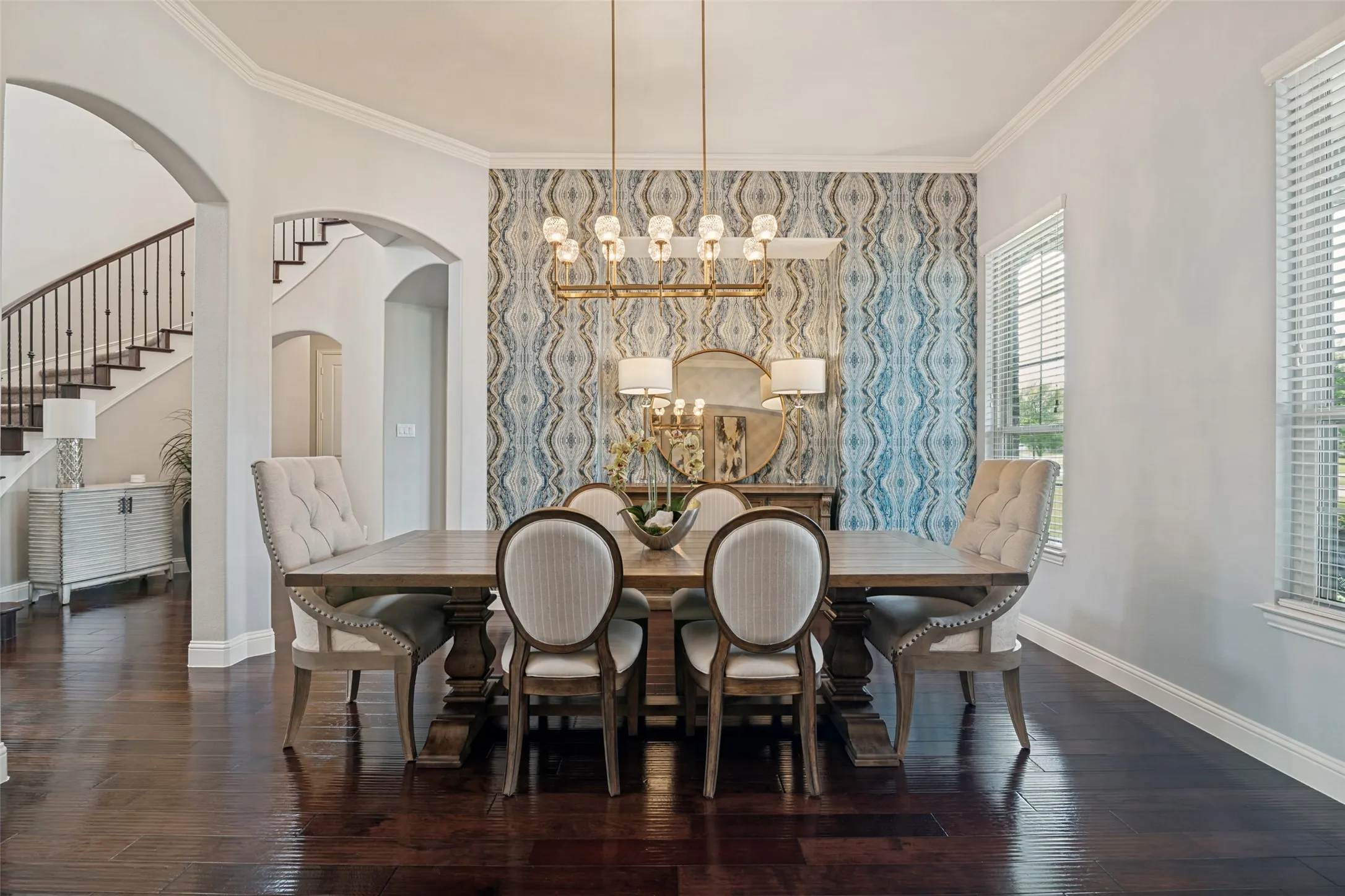 Dark wood-finish flooring with crisp white trim