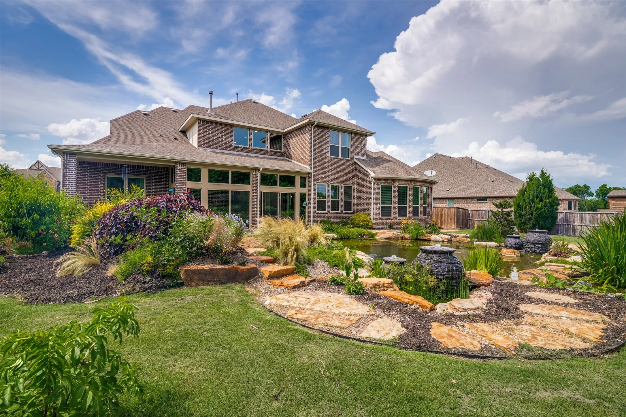Brick exterior home with a gabled roof