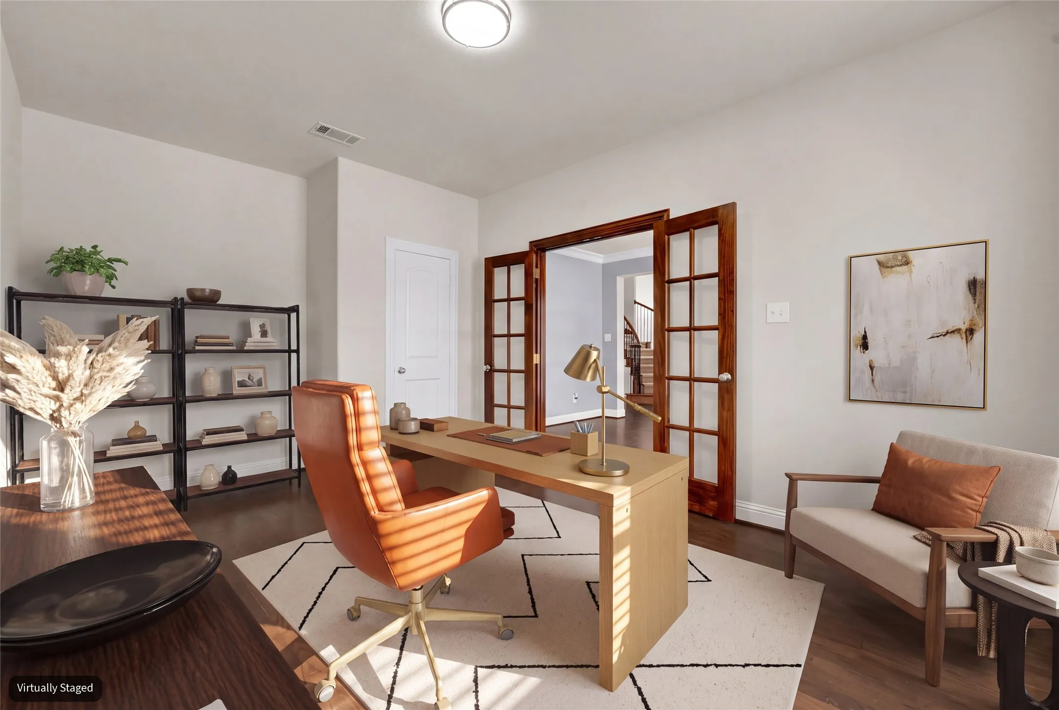 Wood-finish flooring throughout, white wall paint, and recessed ceiling lighting