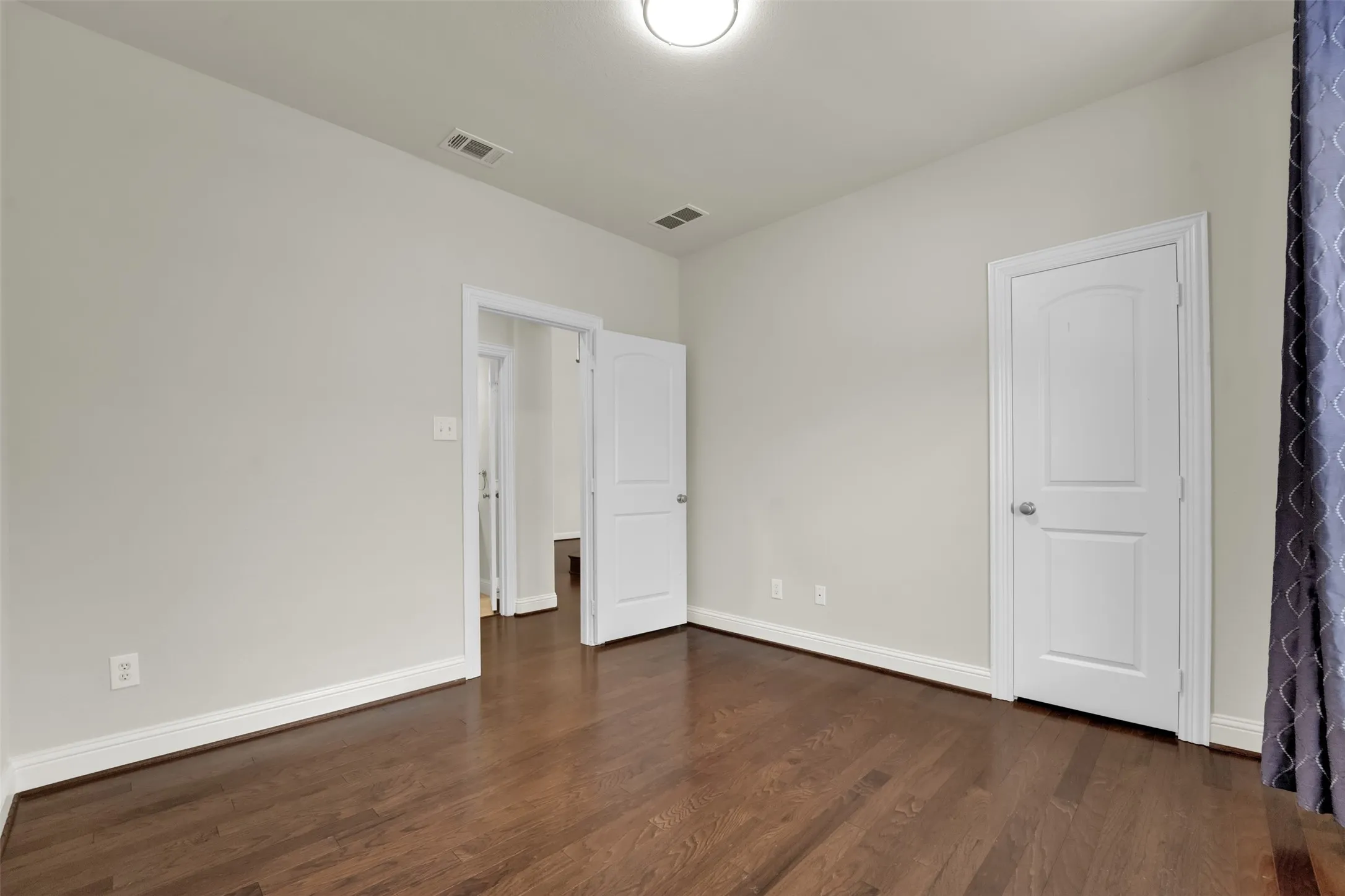 Wood-finish flooring with white trim
