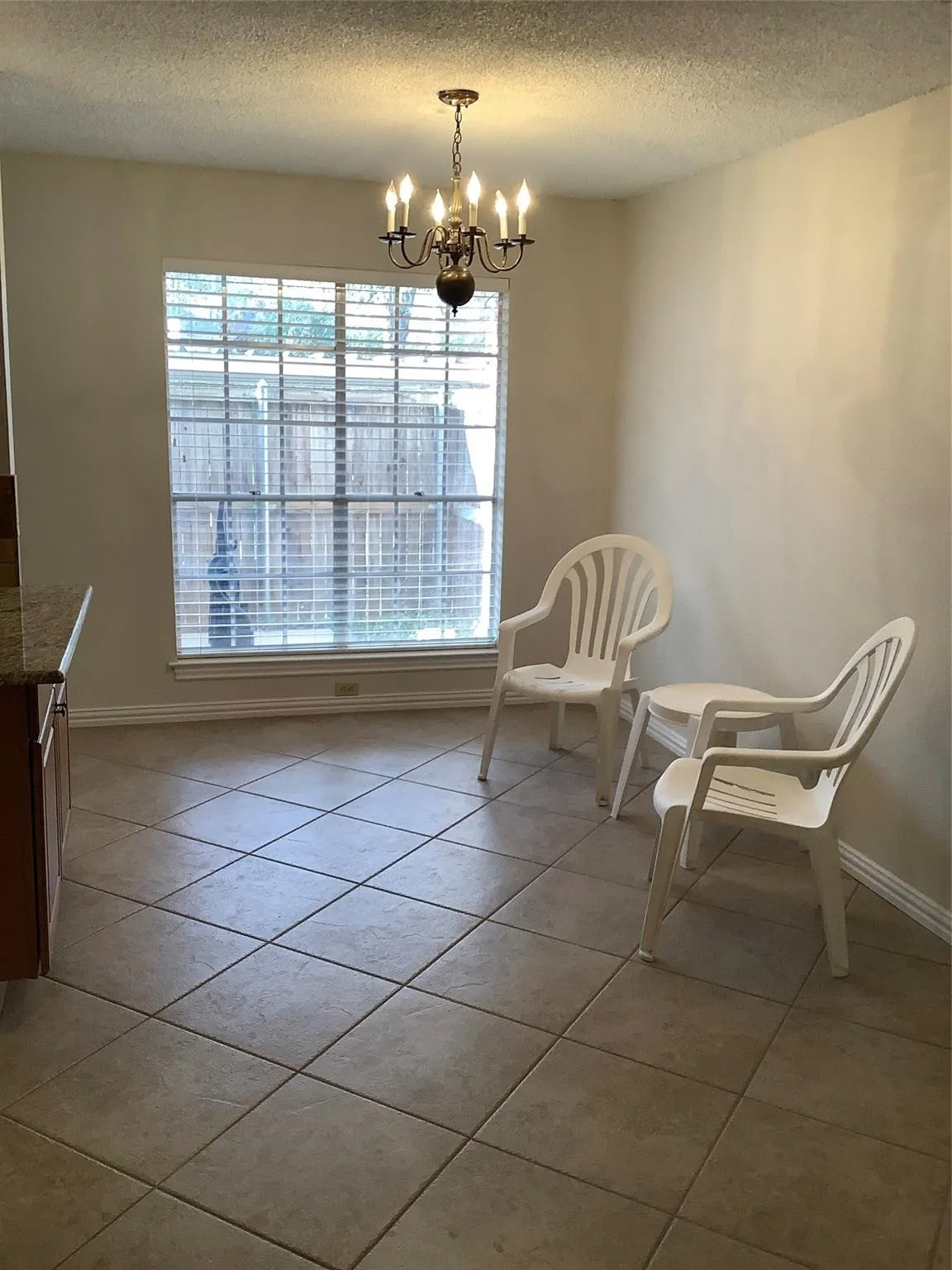 Dining or sitting area of of the kitchen with a pass through island area make it easy for entertaining