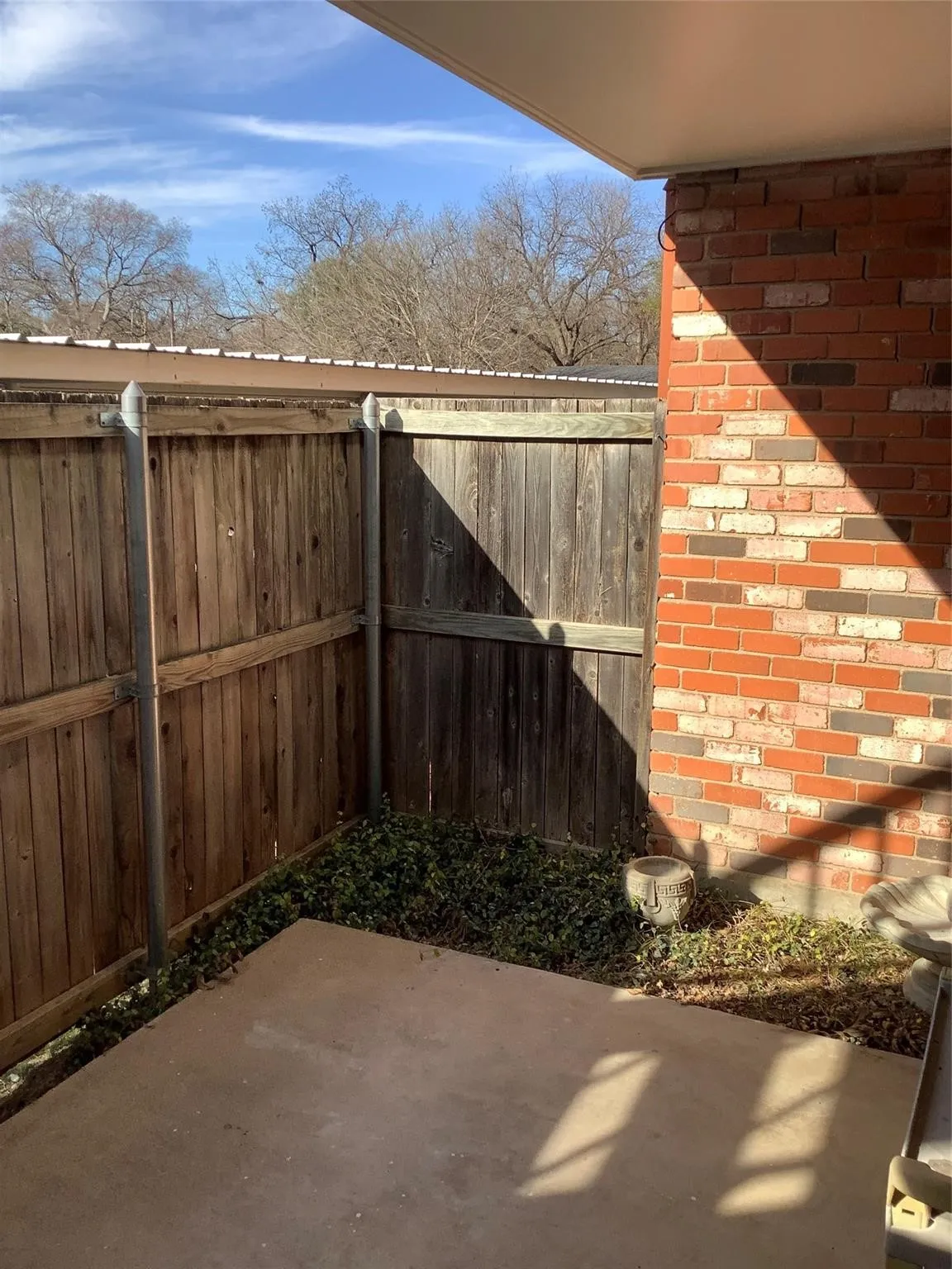 Back patio offers privacy and mostly shade. Parking is just steps away.