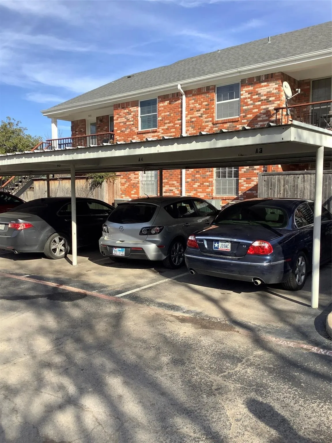 One designated, covered space (A6) is for you. Uncovered spaces through property are unassigned.