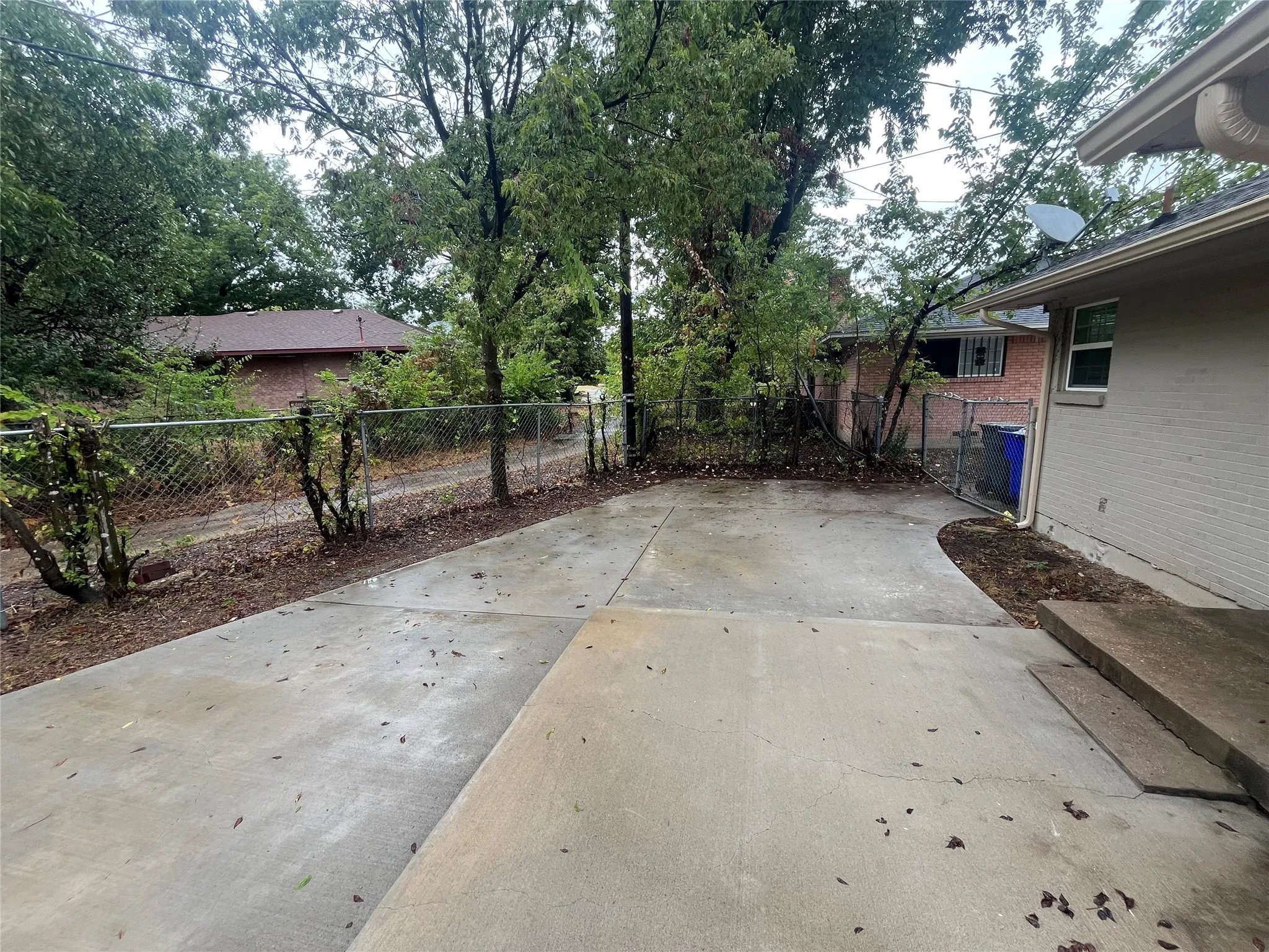 Concrete patio with an adjacent concrete pathway