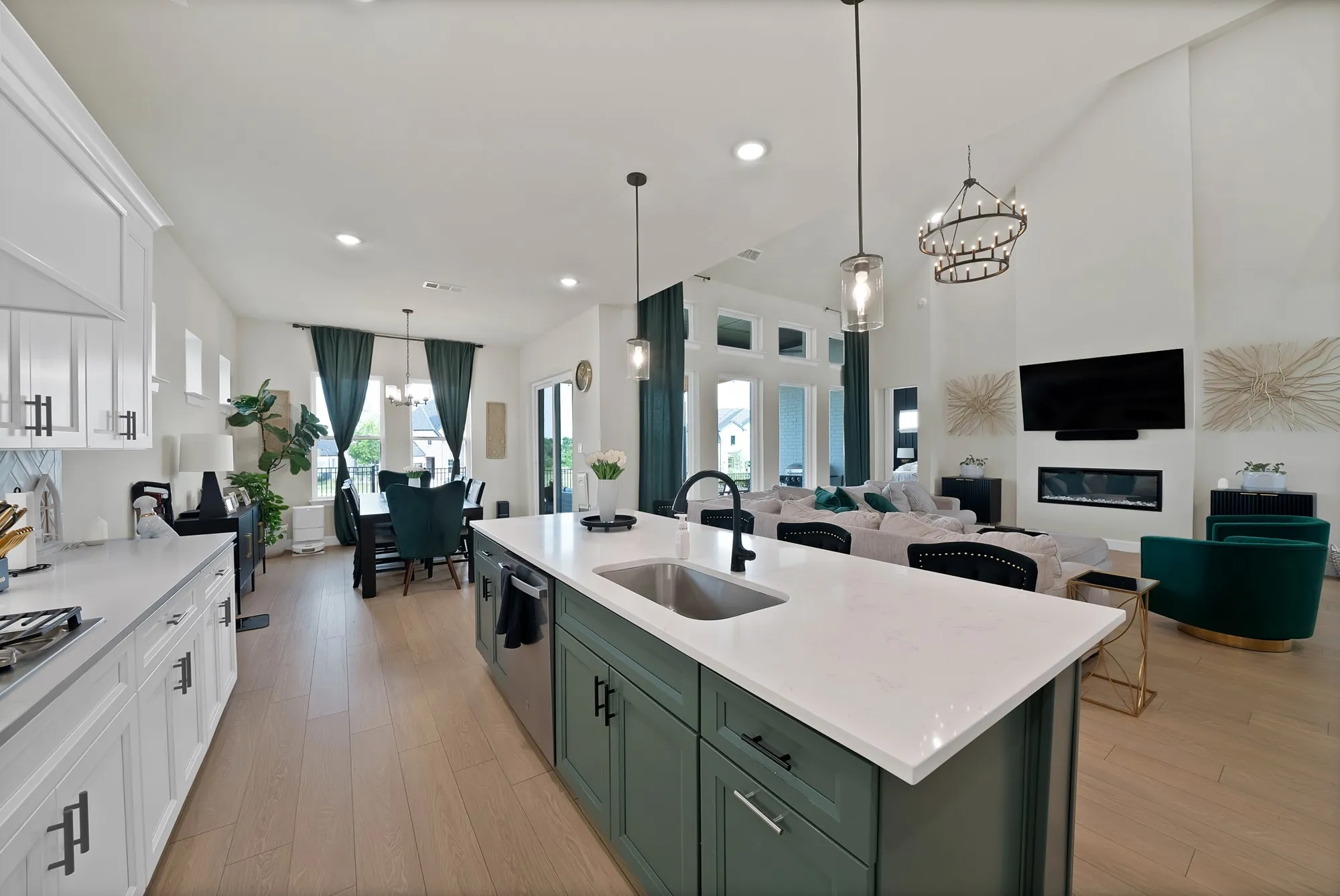 Modern kitchen island with a built-in sink and pendant lighting