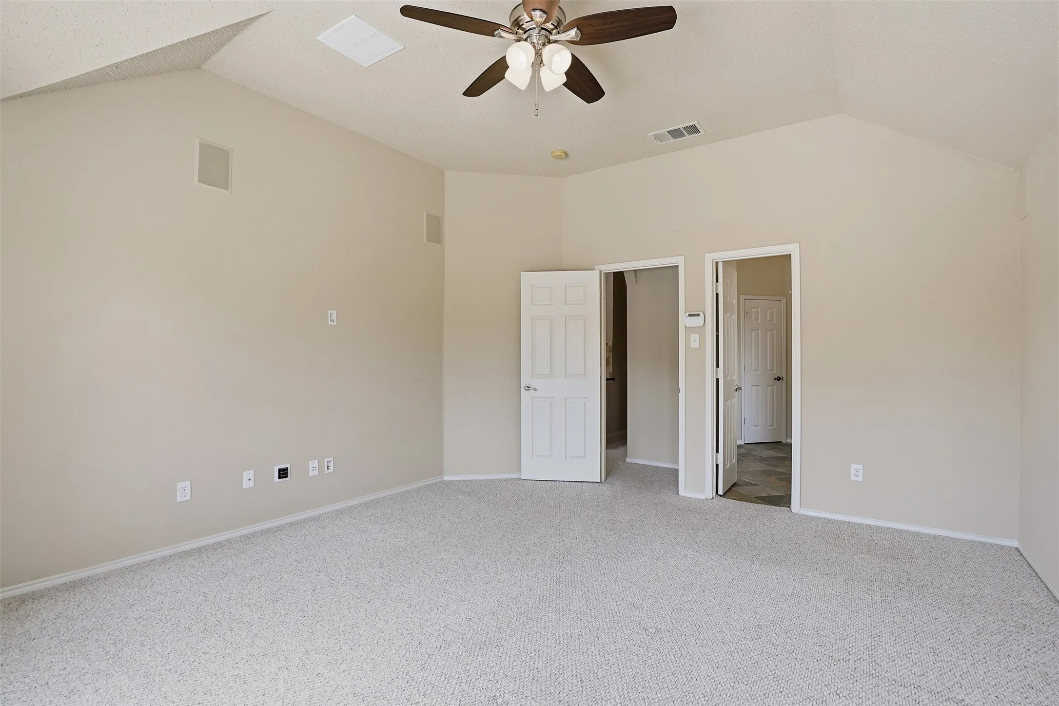 Entry from Primary Bedroom into Primary Bathroom