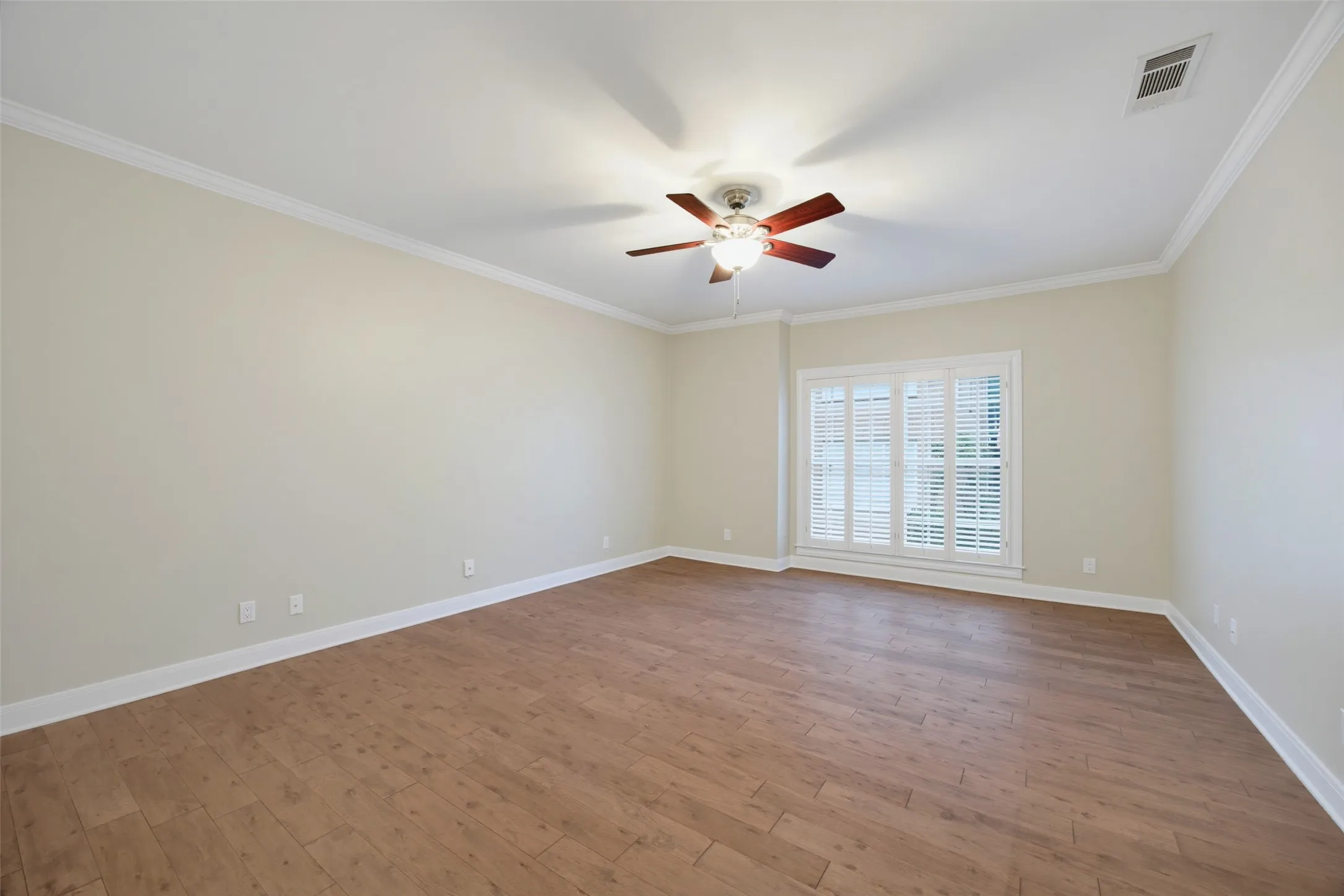 Another view of primary bedroom