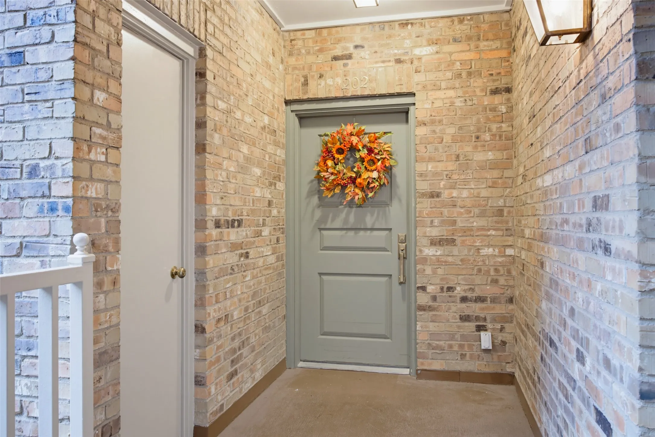 Front entry with extra storage closet.
