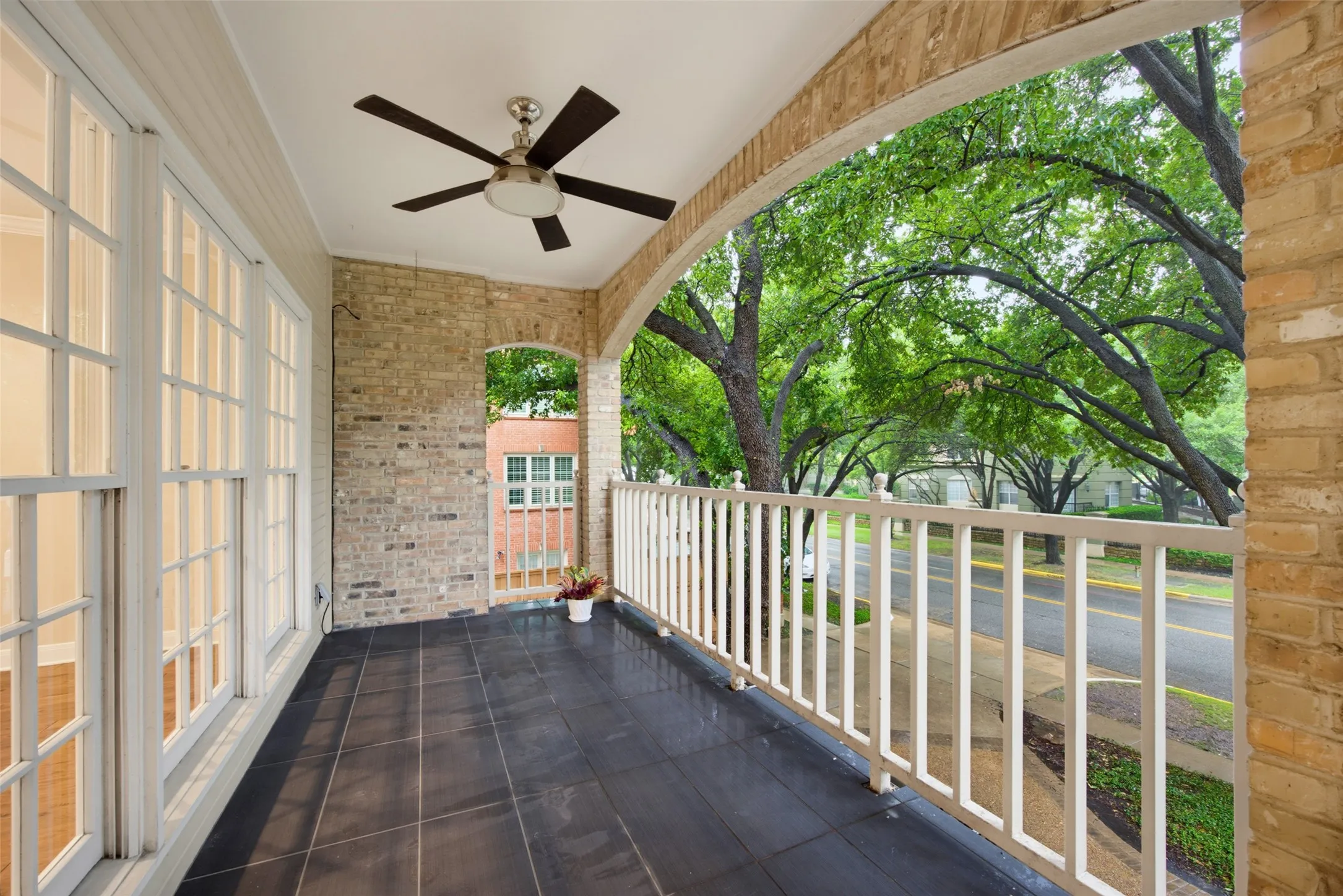 Tree top views from your covered balcony off the living and dining rooms
