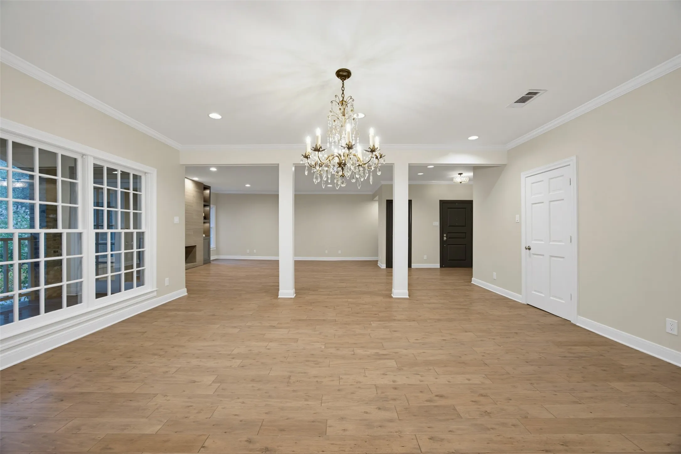 Spacious dining room with chandelier and outdoor views
