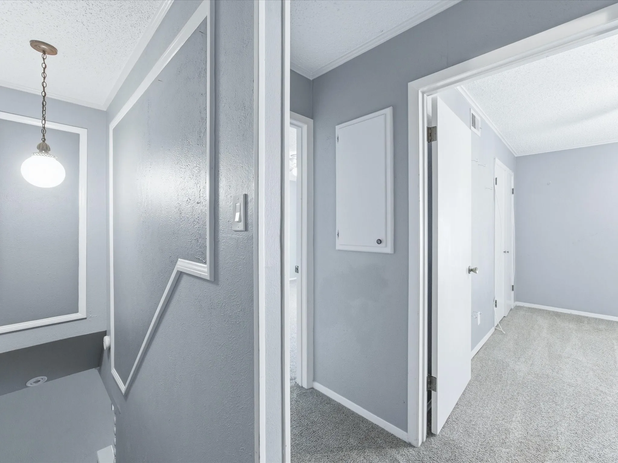 Wall paneling detail with an overhead light fixture