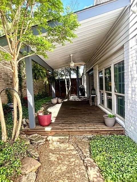 Side yard with covered deck