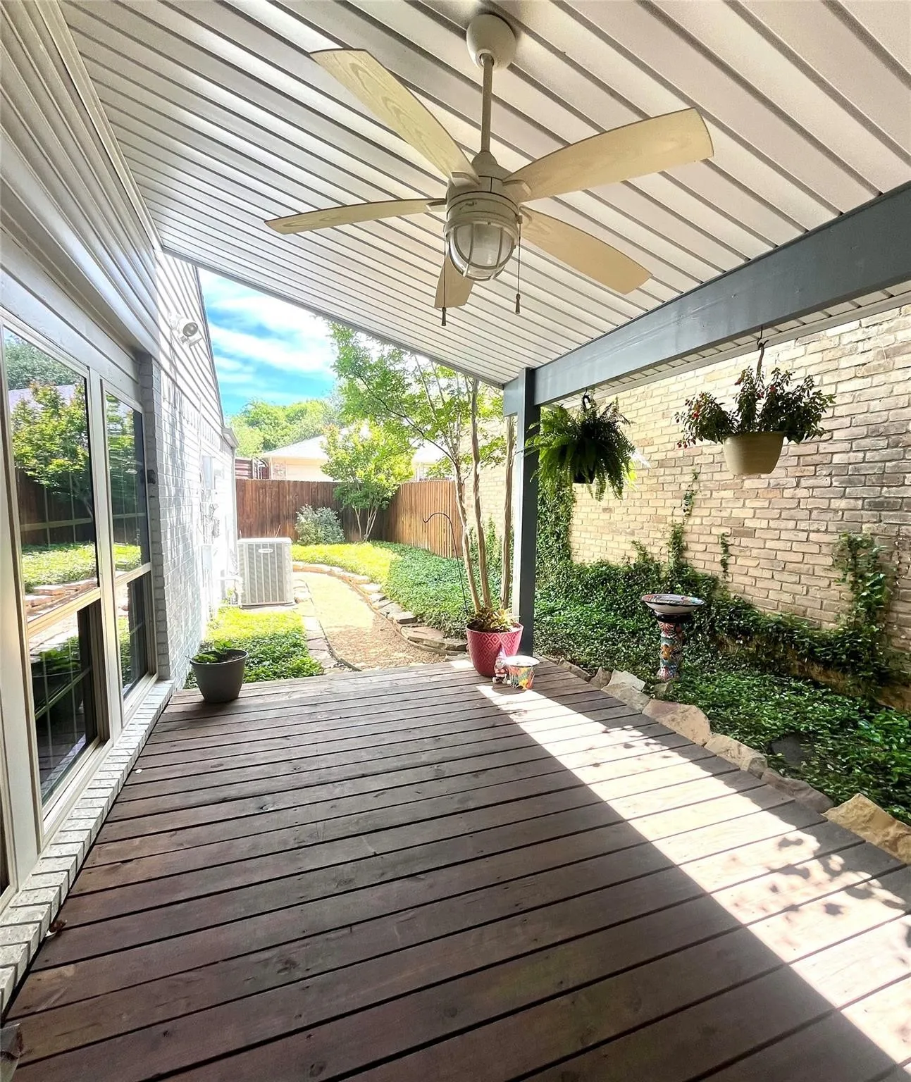 Side yard with covered deck