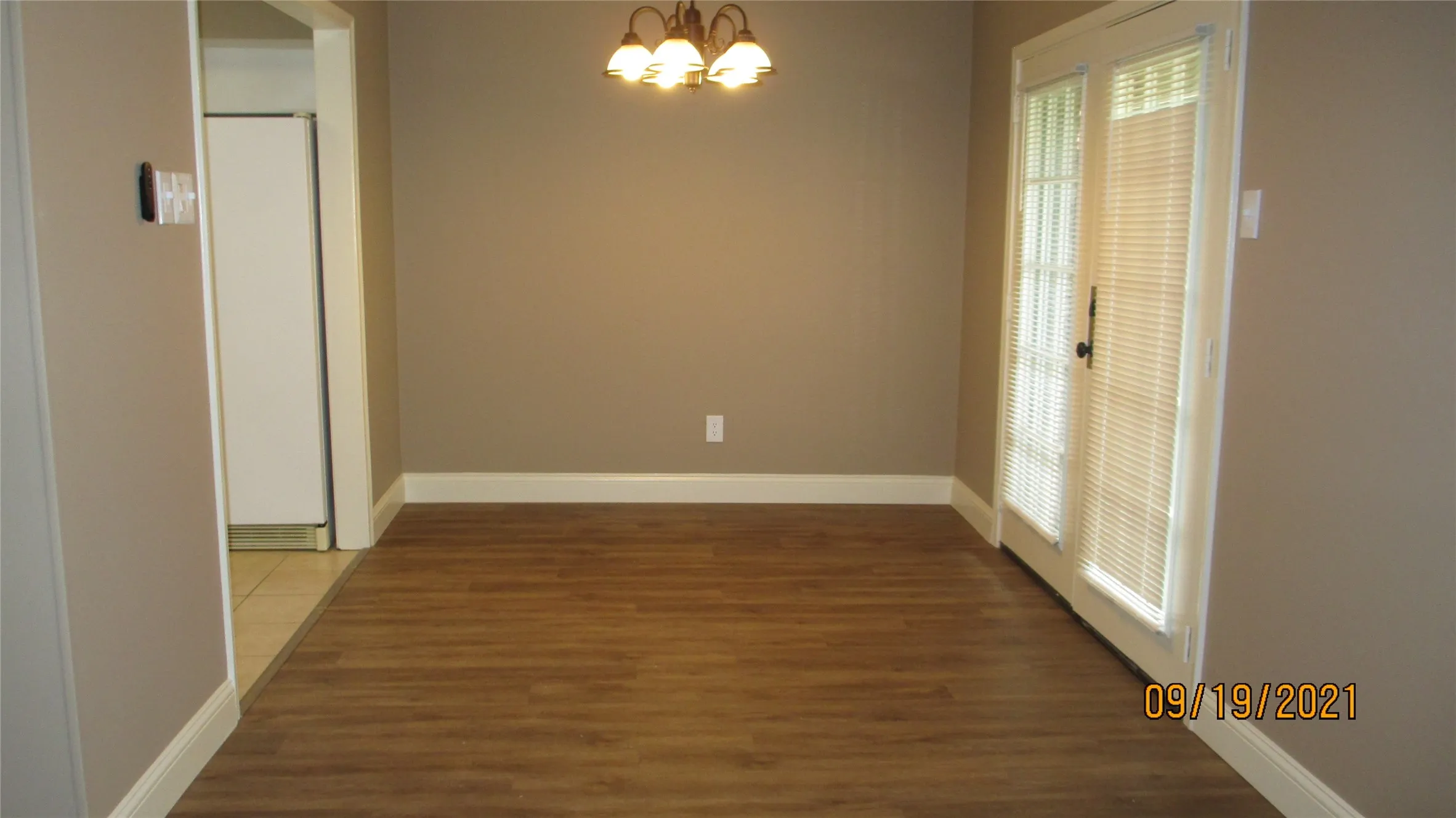Dining room has French doors to back yard