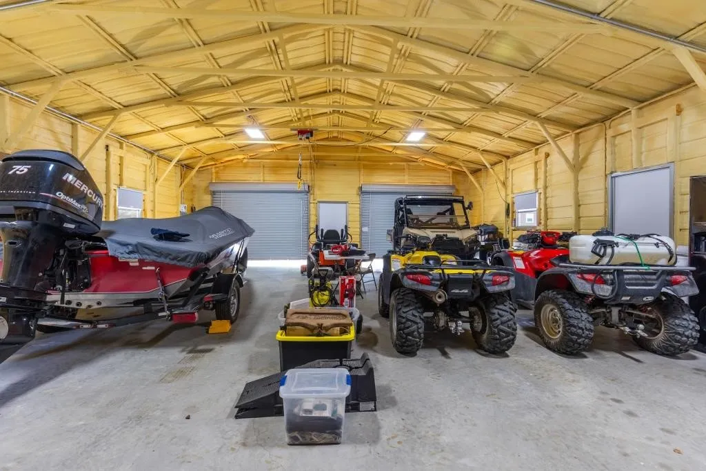 Insulated Garage, Concrete floor, Has Electric & Water