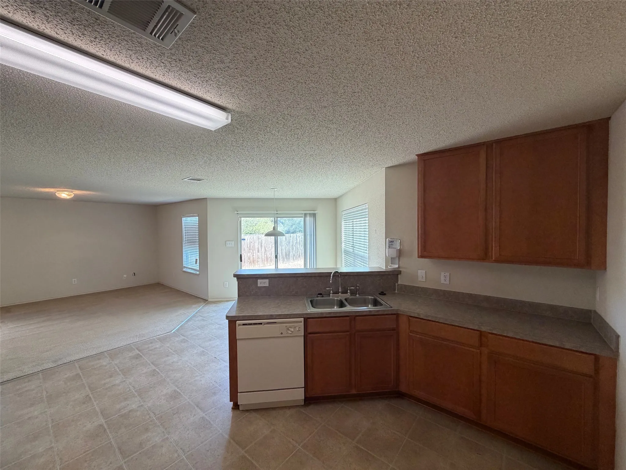 Kitchen open to breakfast room and family room.