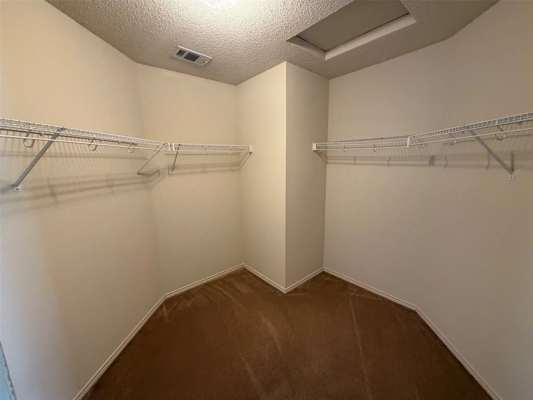 One of two primary bedroom closets