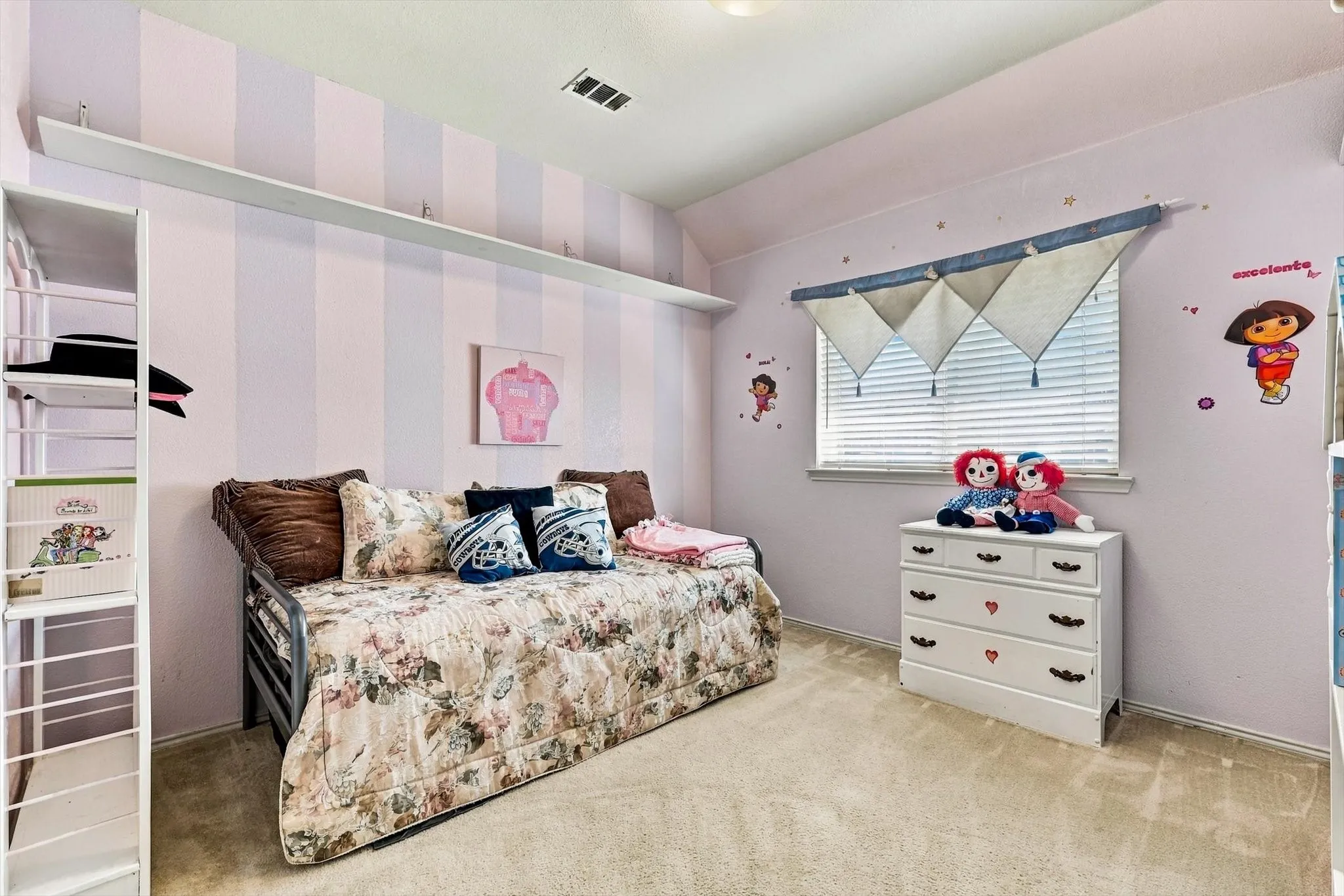 Wall-to-wall carpeting with a neutral finish, complemented by a window with horizontal blinds