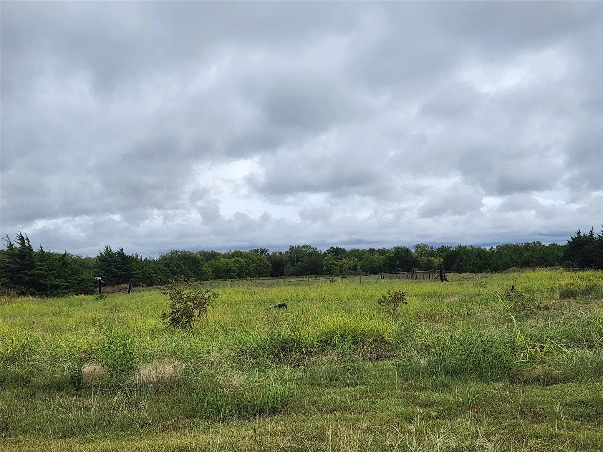 Flat land bordered by other rectangular residential lots