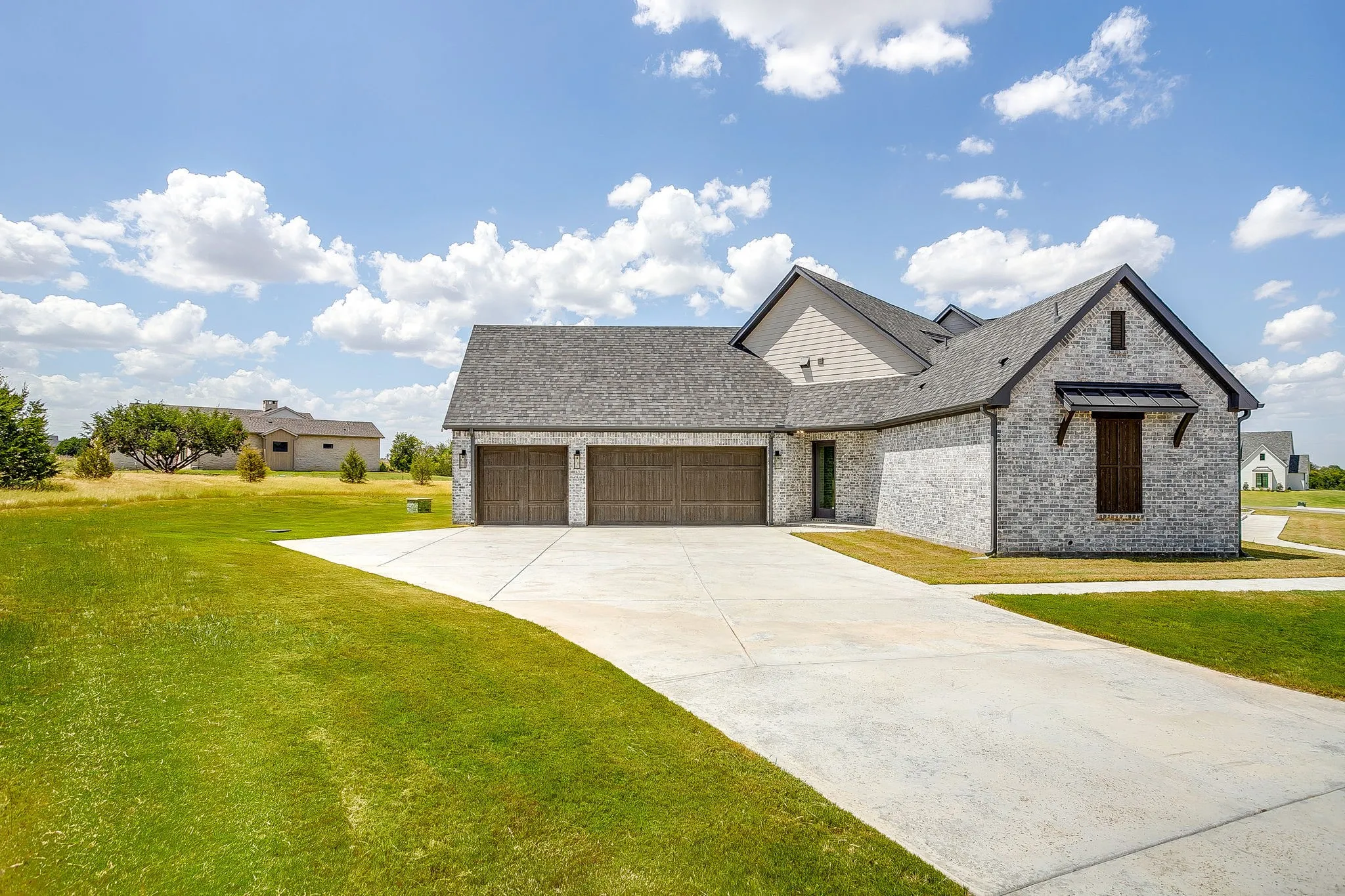 Three Car Garage with Oversized Driveway