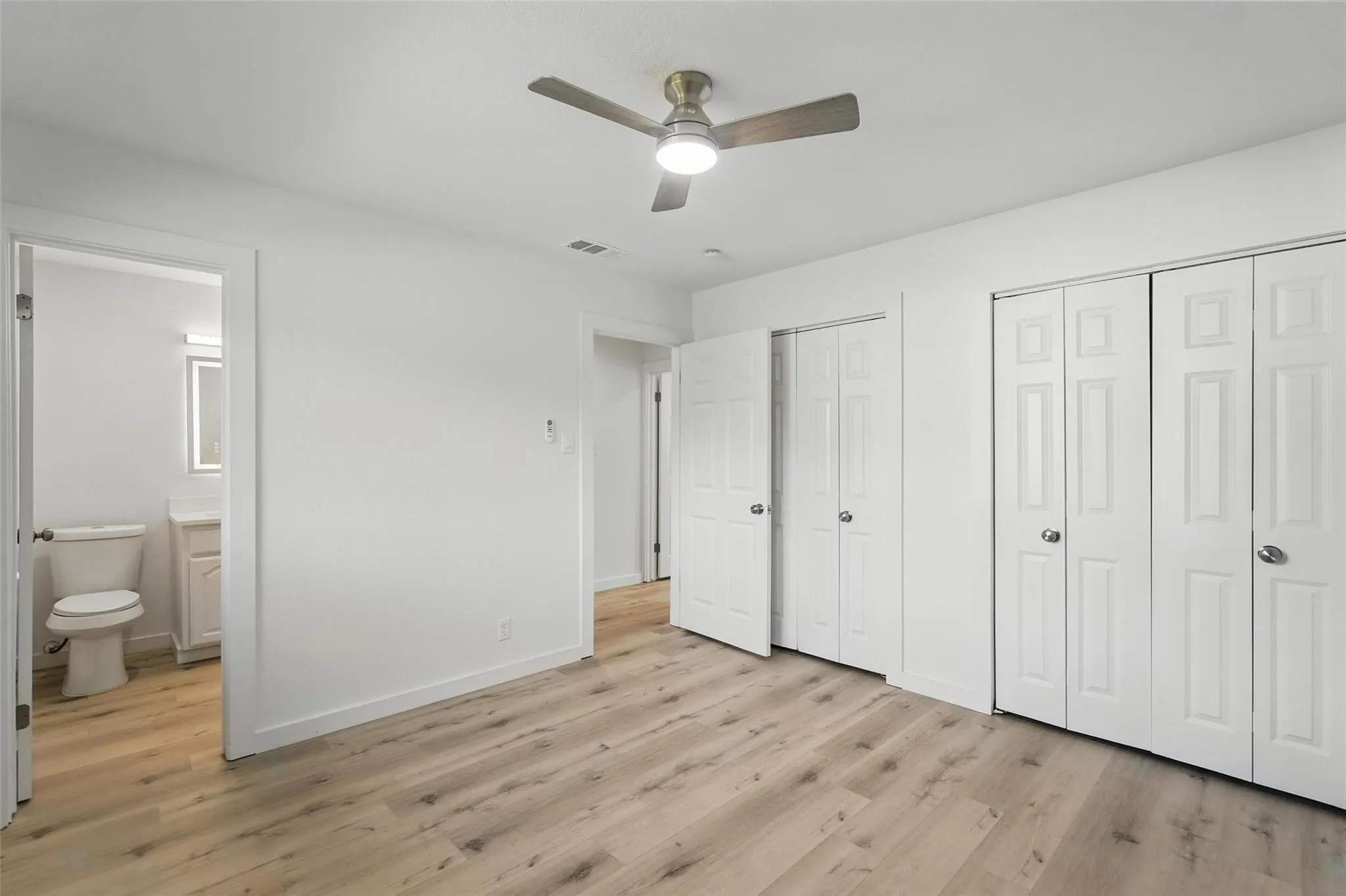 Primary Bedroom with en suite bath and double closets.