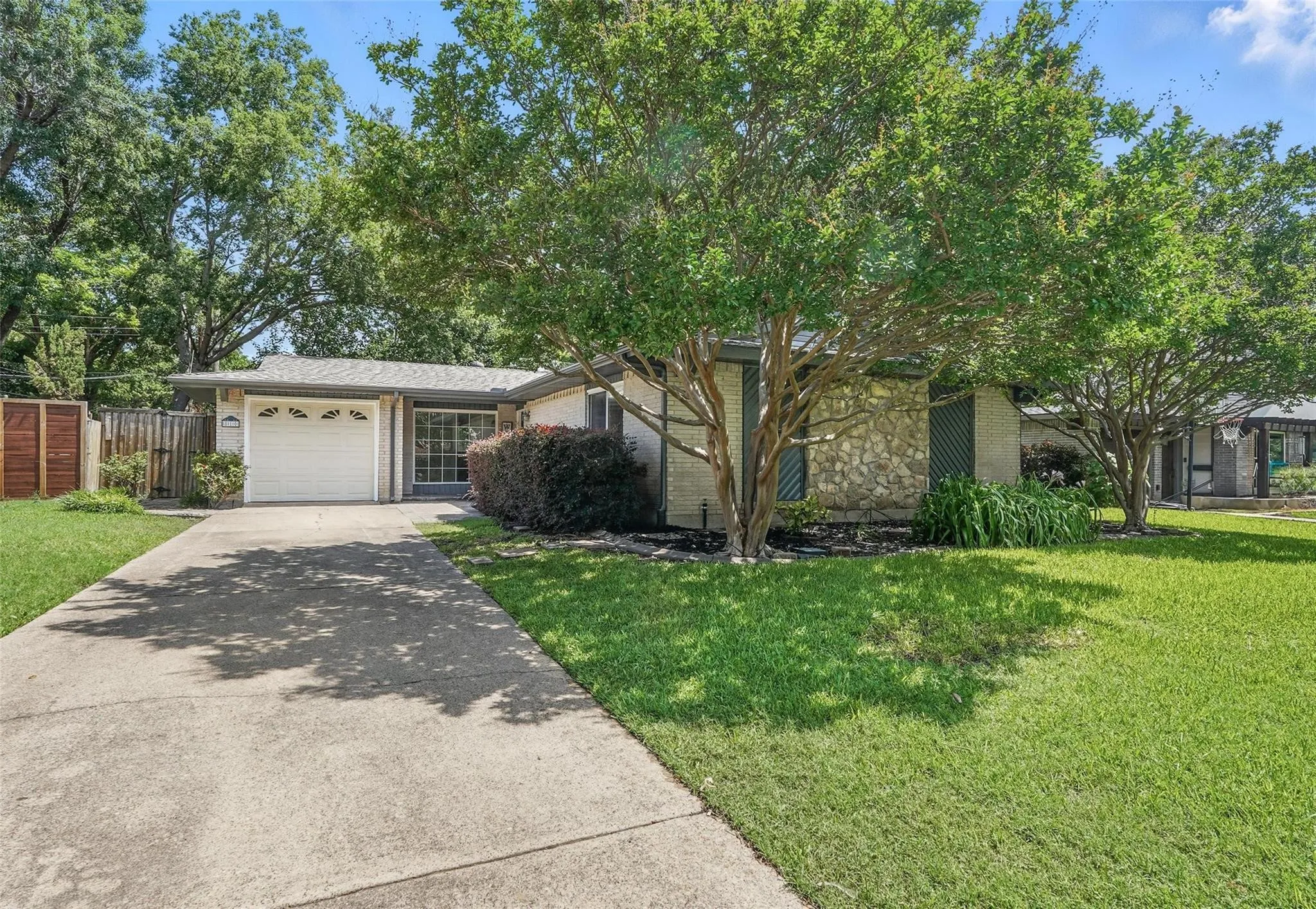 Wonderful Greenwood Hills location, quiet interior lot, attached garage, large backyard.