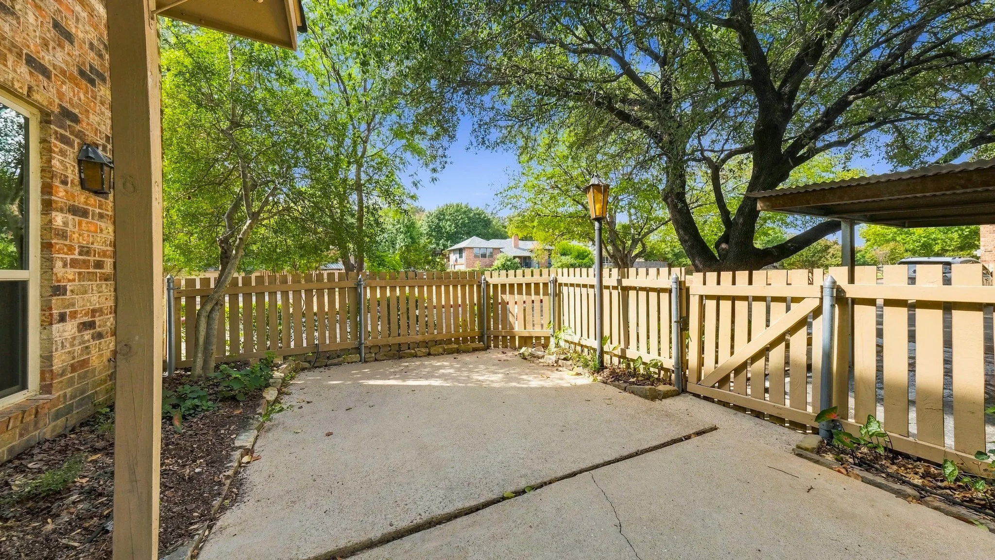 back patio stately trees,greenbelt, Trinity Trails, creek, 2 assigned covered parking immediately to right
