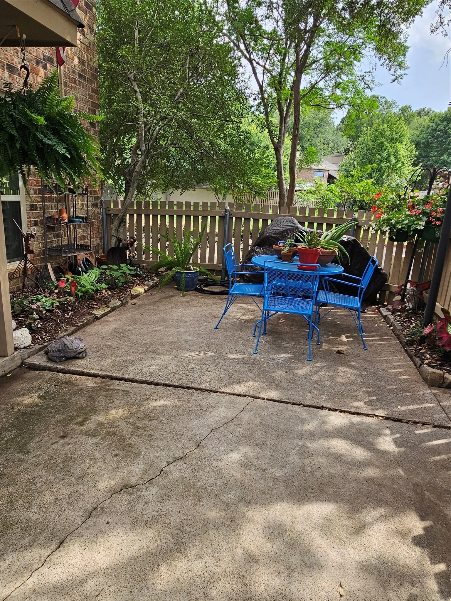 large back patio, 2 covered parking immediately to the right of picture