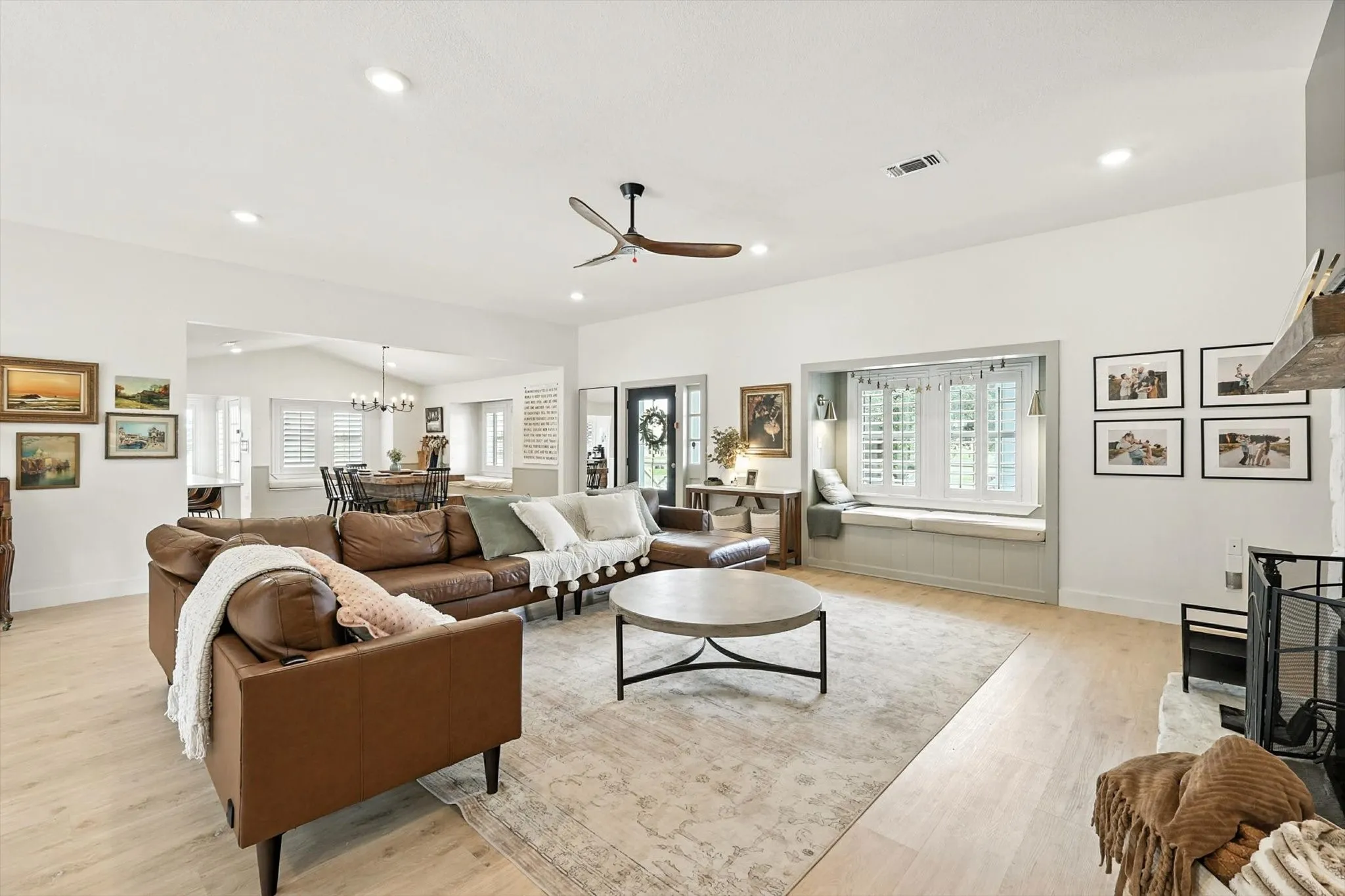 Recessed lighting illuminating light wood-finish flooring