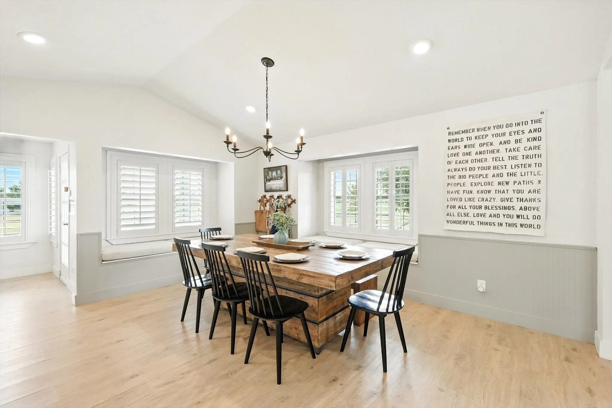 Vaulted ceiling featuring recessed lighting