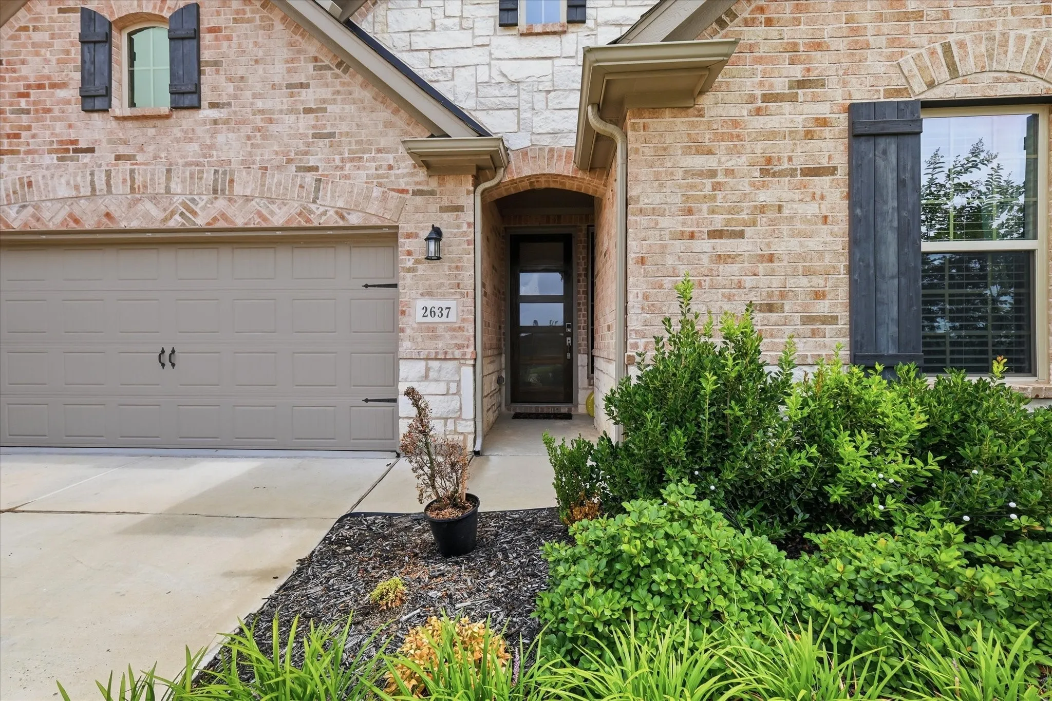 Brick exterior with stone accents