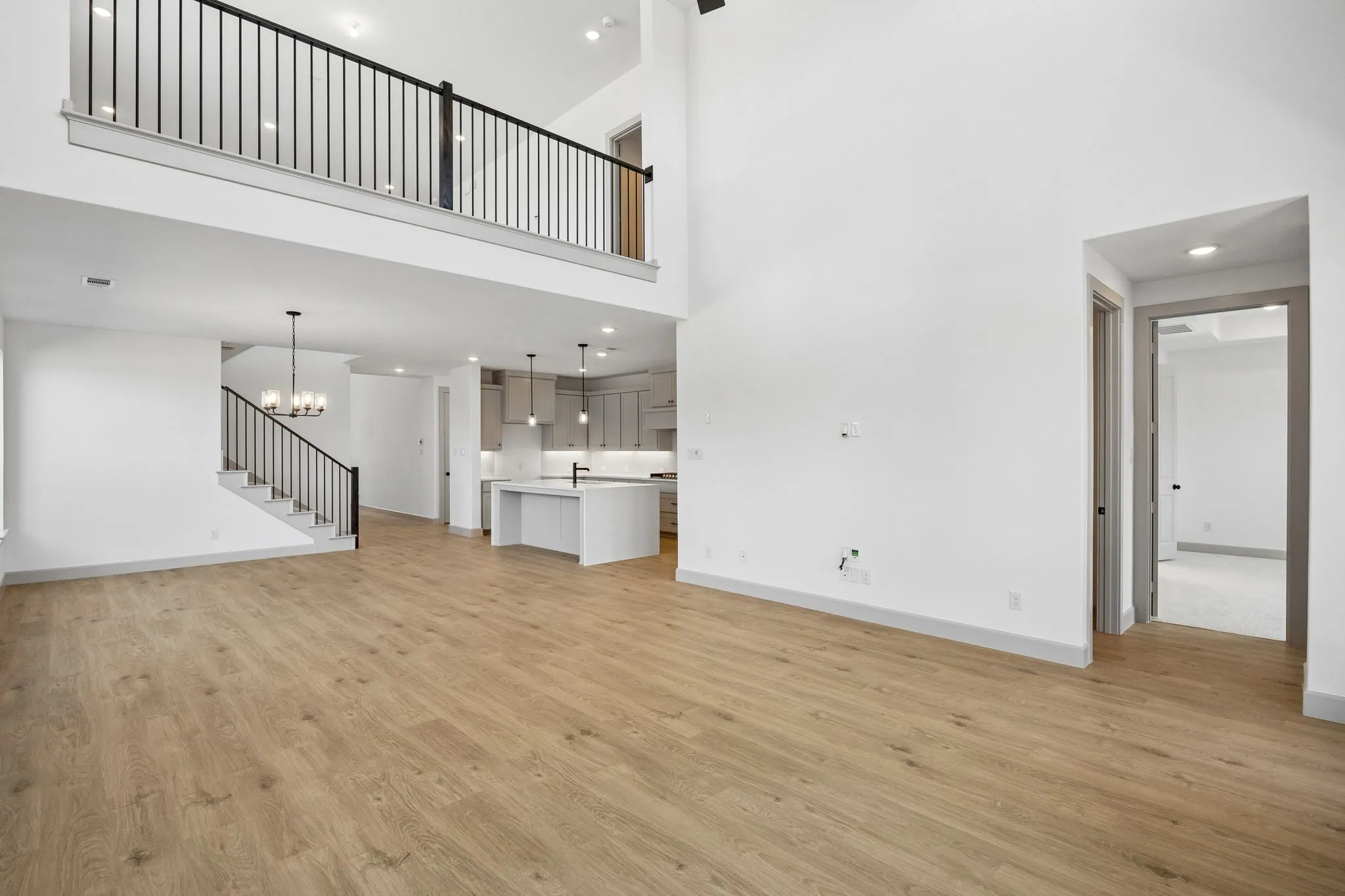 With the family room open to the game room above, you'll enjoy multi-level entertainment zones in this dream home!