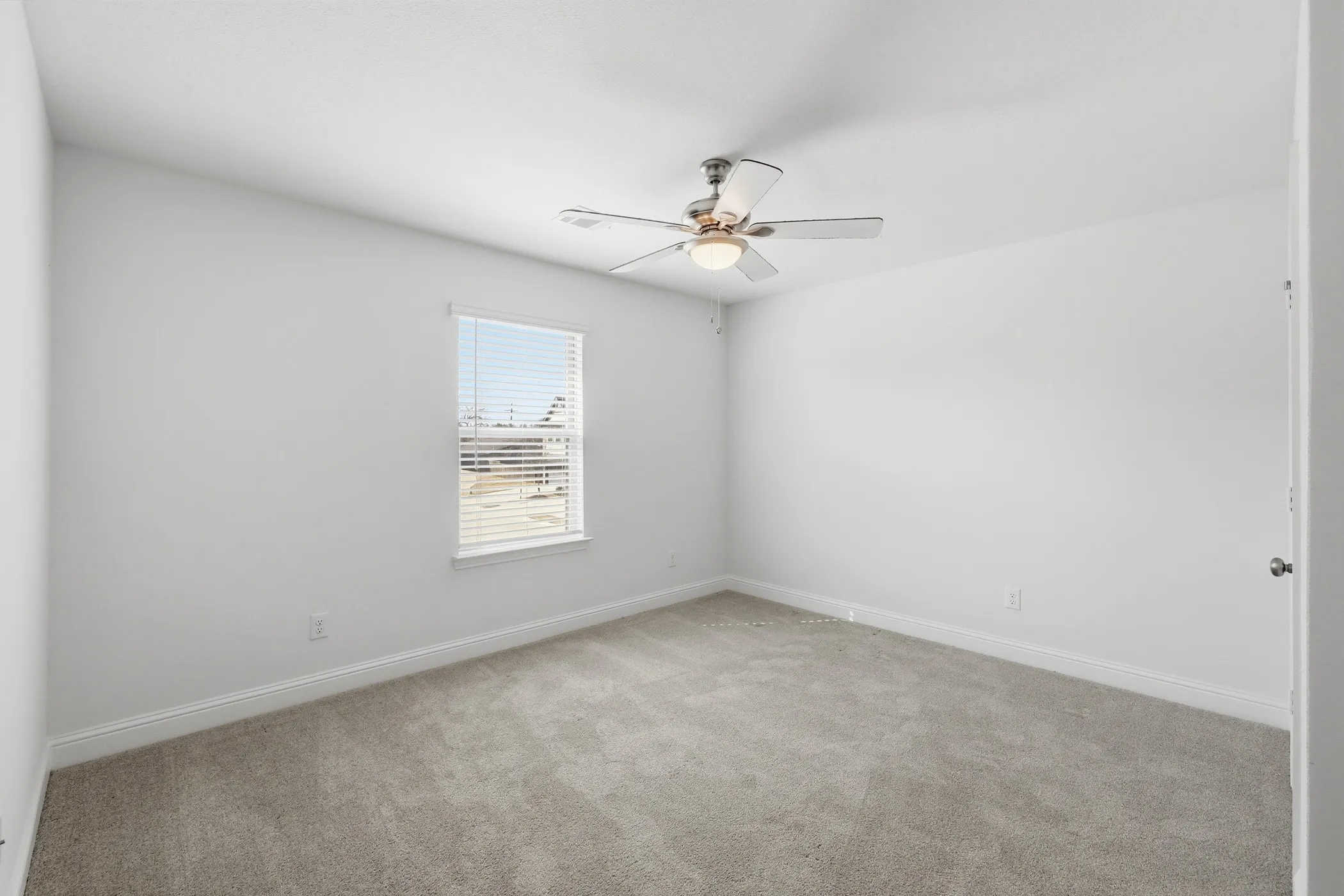 Neutral wall colors with a textured ceiling
