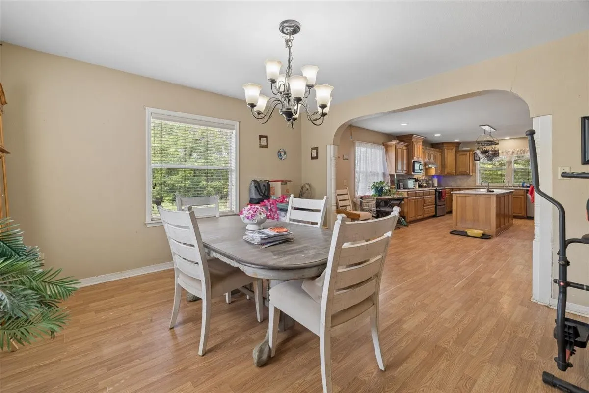 Dedicated dining area with elegant lighting, perfect for family meals and entertaining.