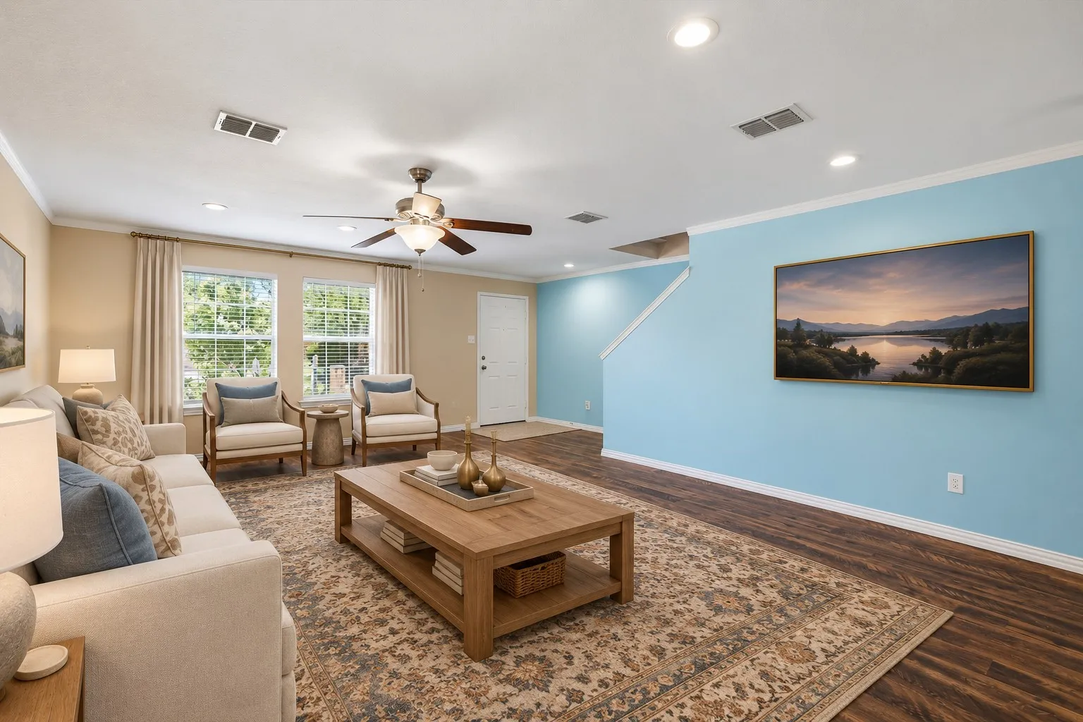Wood-finish flooring, recessed lighting, and a ceiling fan with light fixture