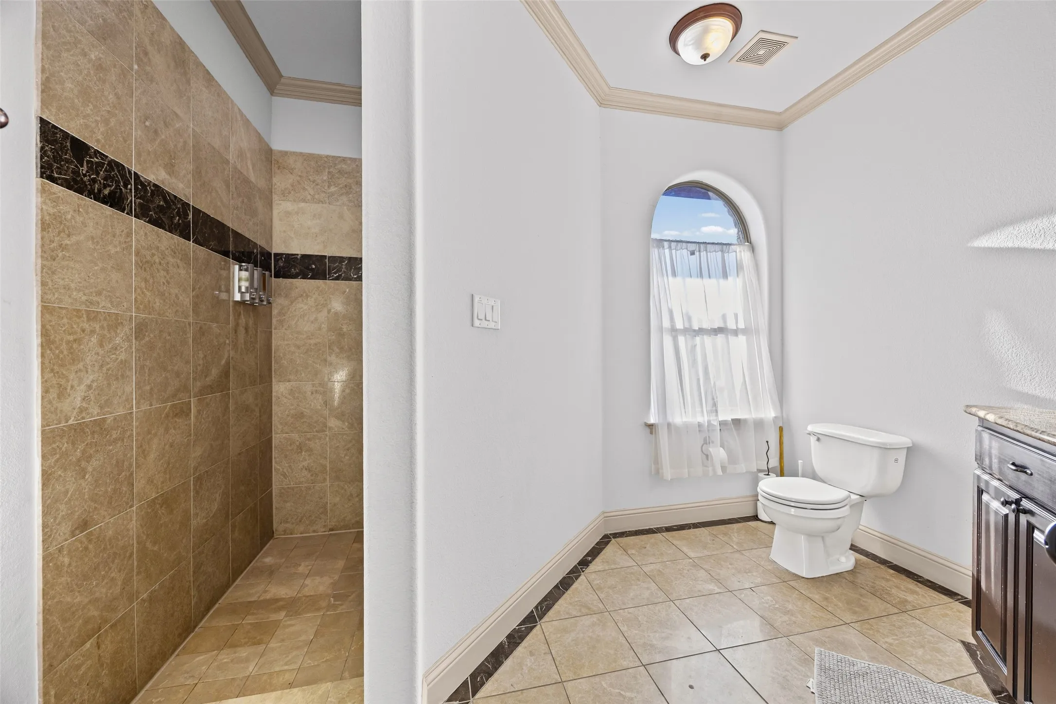 Primary bathroom #2 with walk in shower on level 3