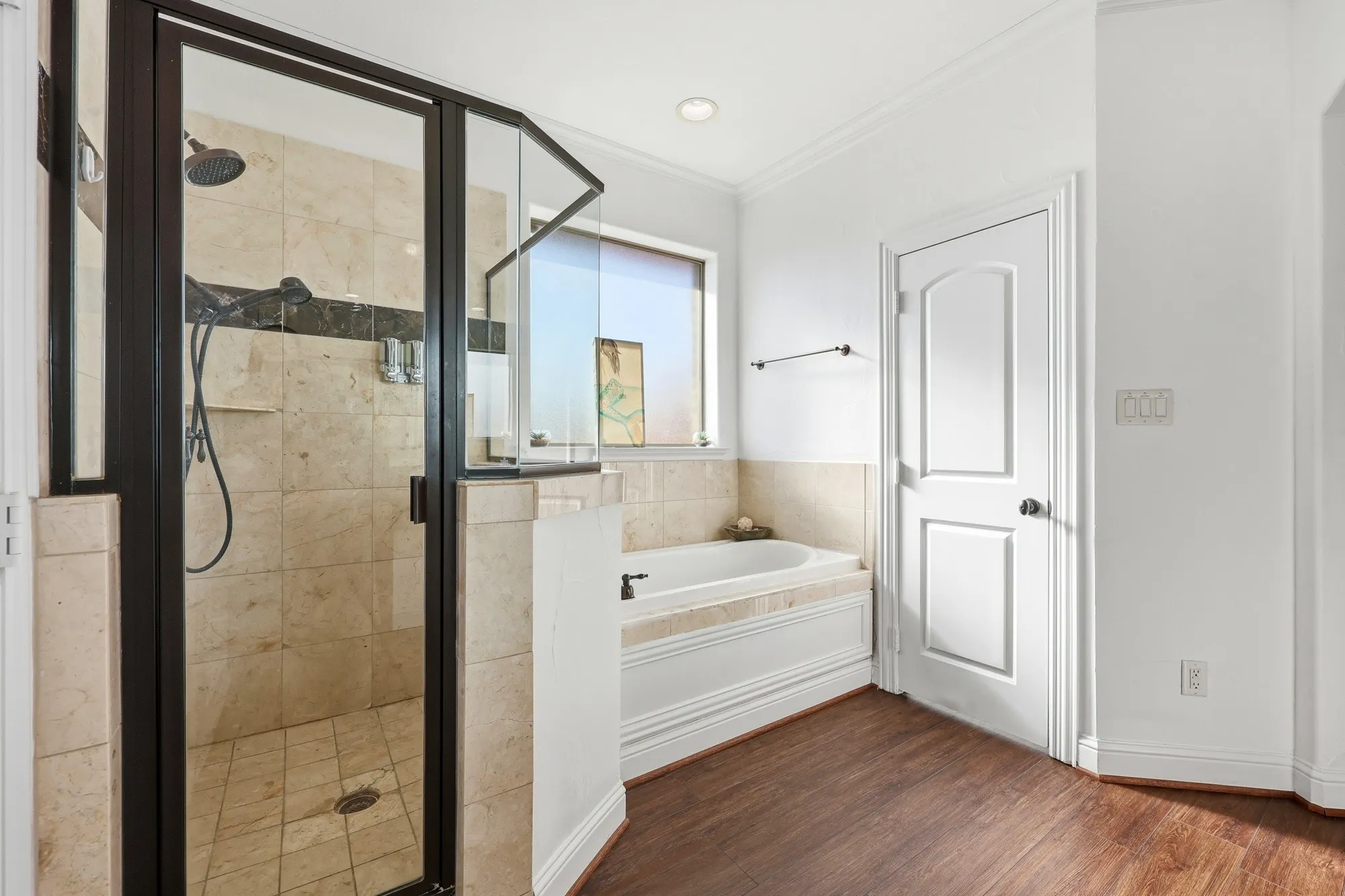 Primary bathroom #1 with separate shower and garden tub on level 3