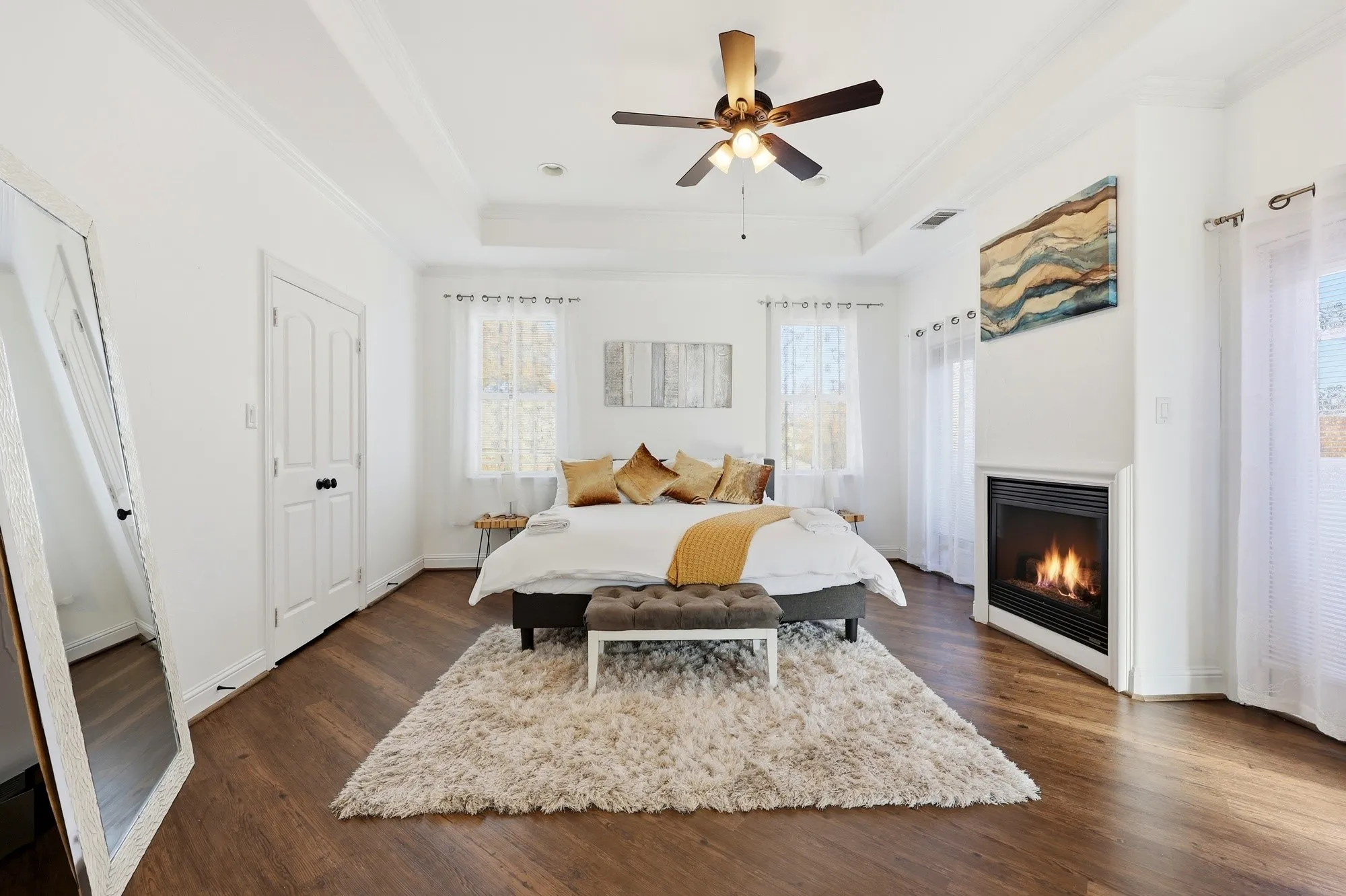 Primary bedroom #1 with electric fireplace on level 3