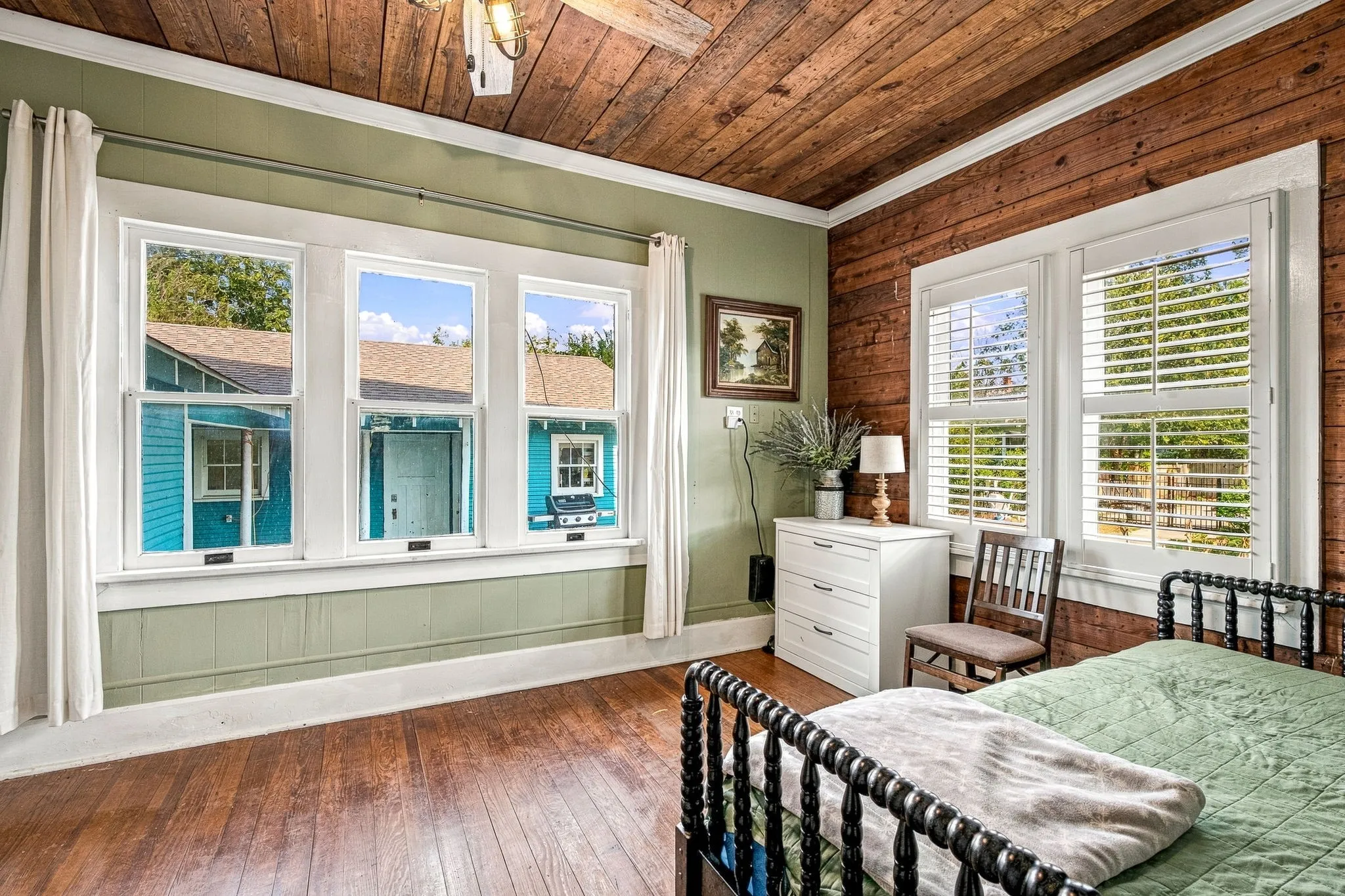 Wood-finish plank flooring, wood-finish plank ceiling, and wood-finish paneled wall