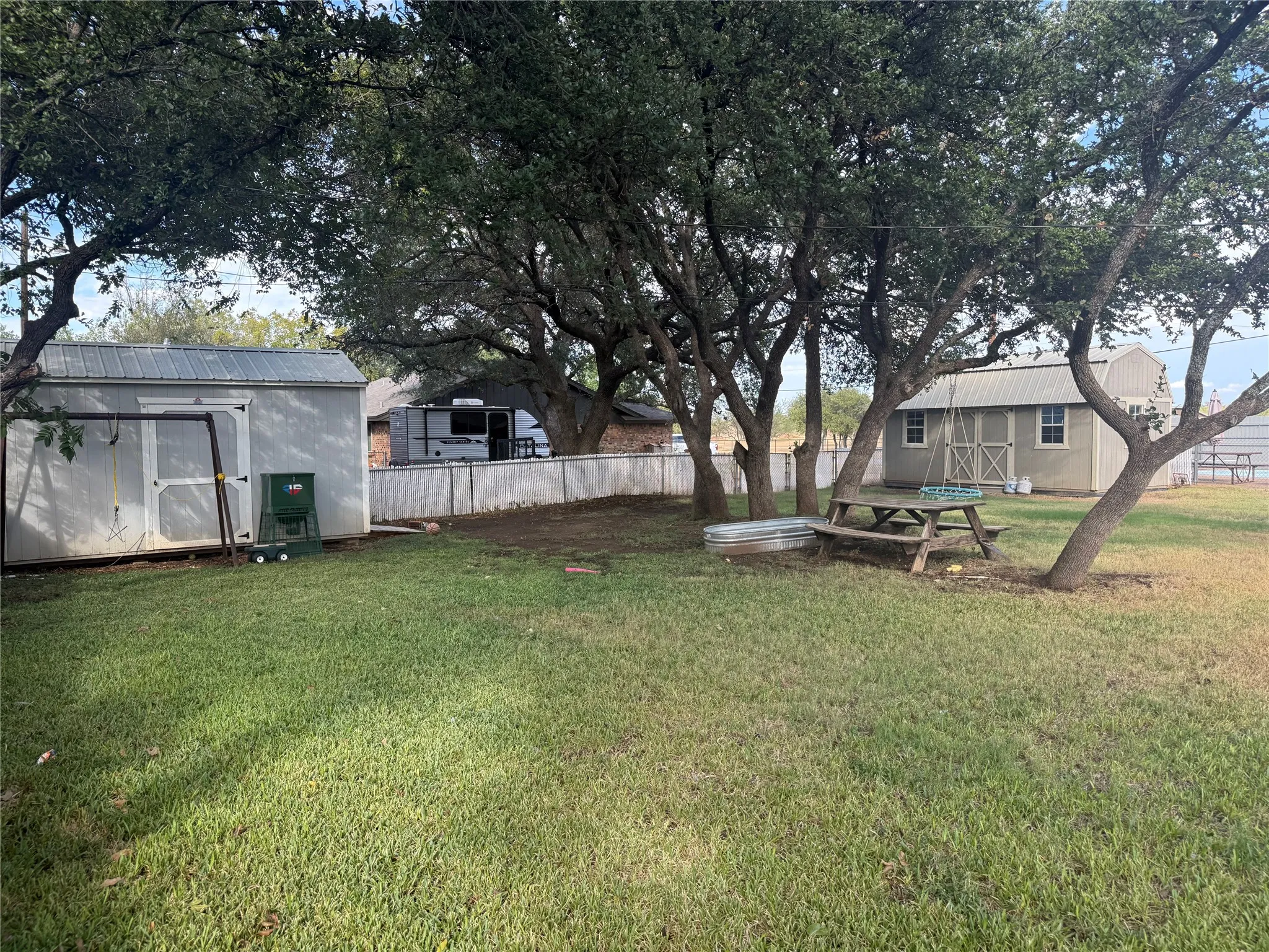 Storage buildings in beautiful backyard